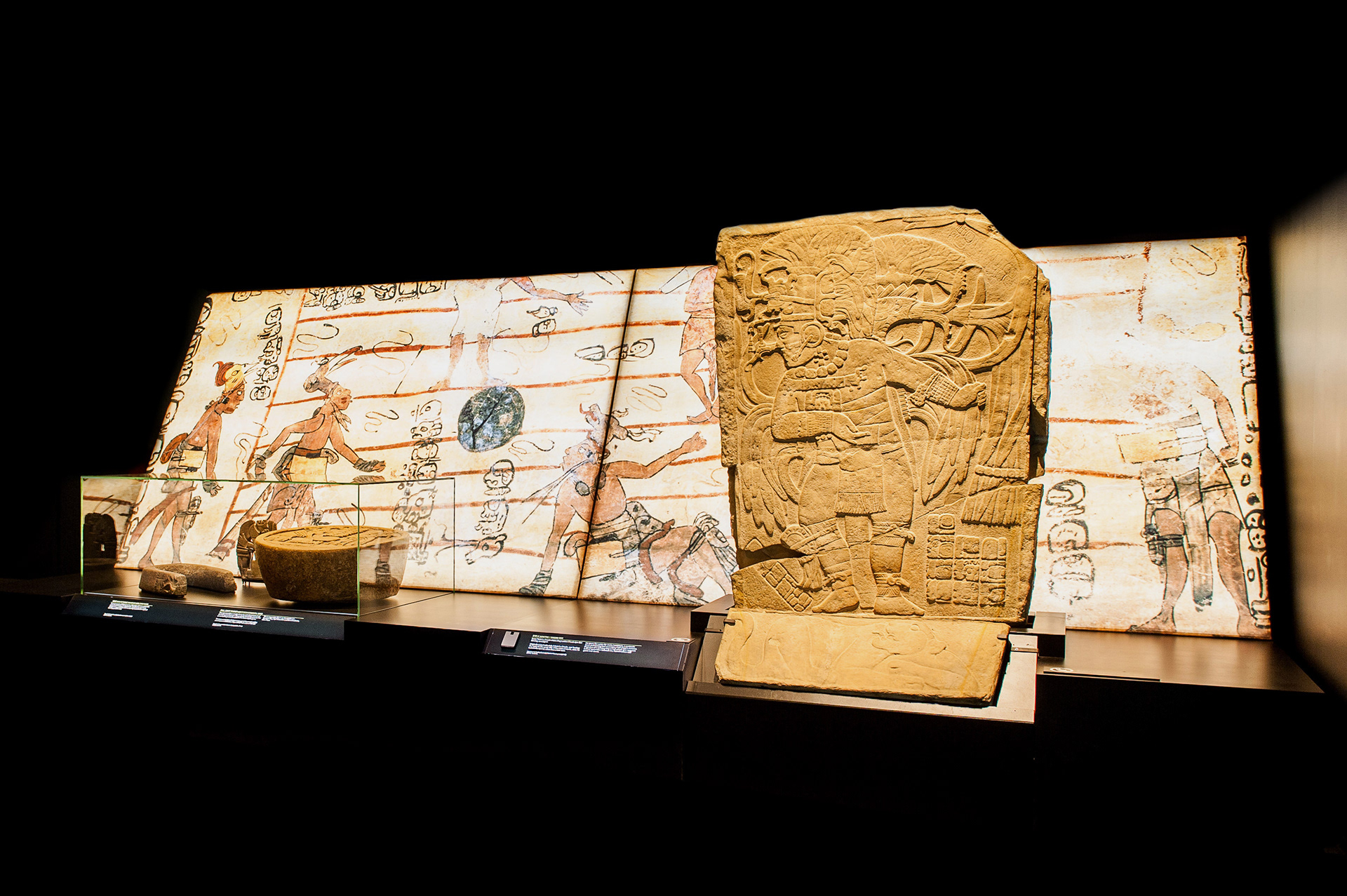 High-contrast matte information panels, featuring crisp white typography that remains perfectly legible against glowing thematic Maya illustrations.