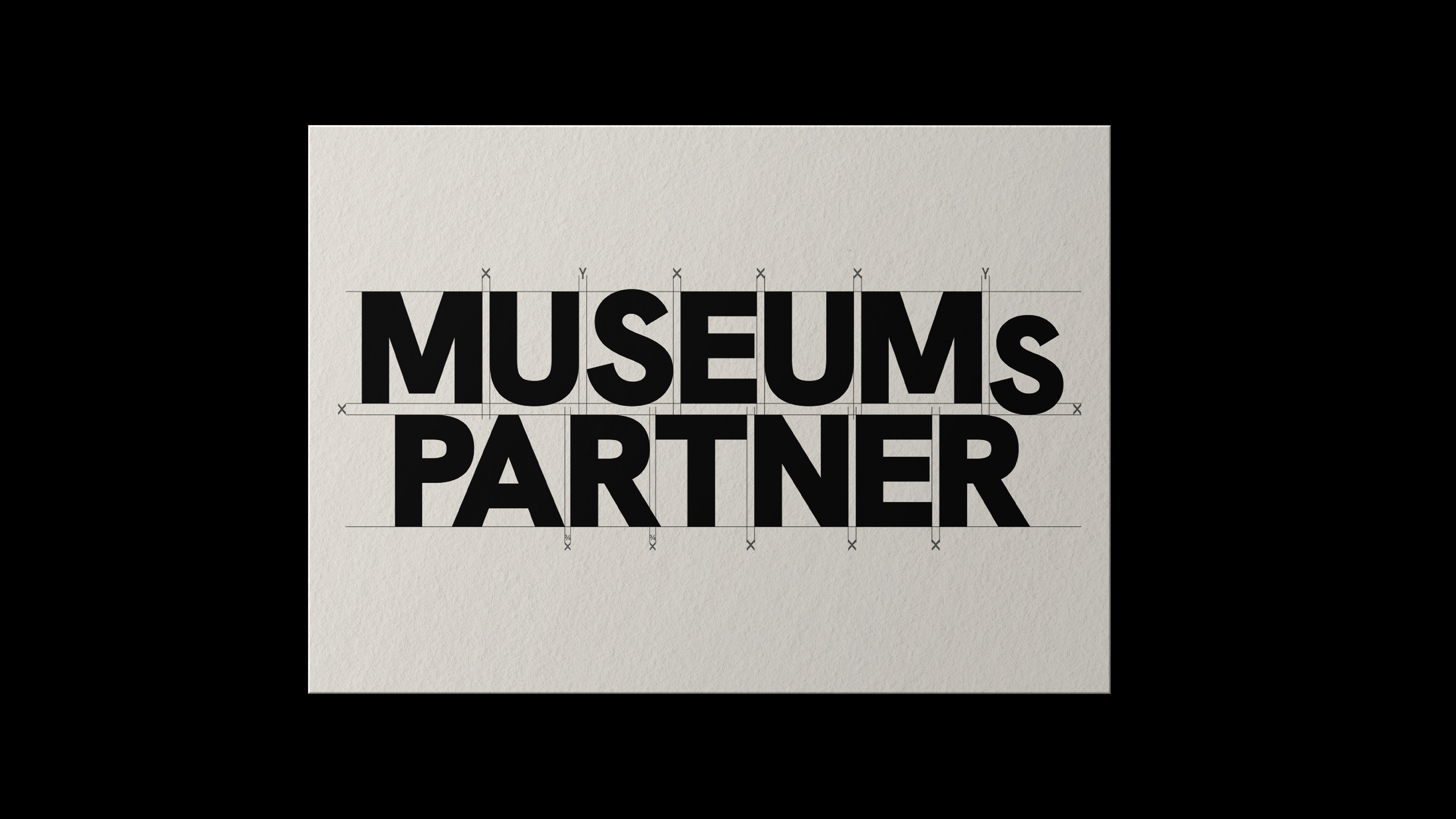 Technical logo construction for Museumspartner, showing the geometric grid system and precise spacing of the custom sans-serif wordmark.