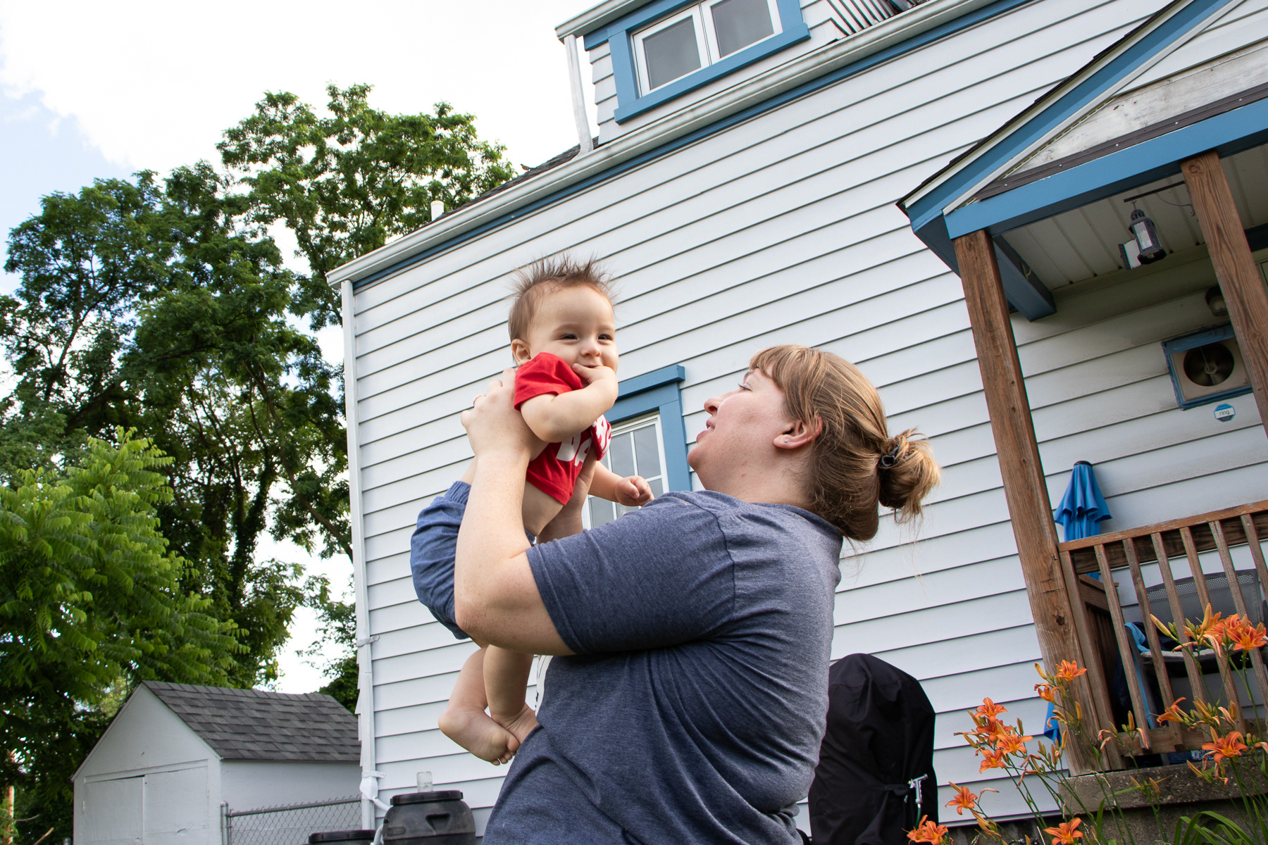 Isabelle Cajka takes an evening stroll with her son, Hector, through their gardens to wind down for the evening.