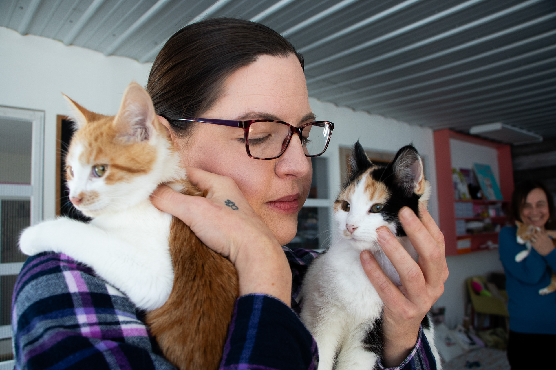 Lydia Wayman, pictured, and Cristina Rouvalis interact with cats at Cats N’At in Wexford Pa. Both worked together to write a middle-grade book for kids about an unlikely pair of friends, one of whom is obsessed with cats. Go to NEXTPittsburgh for the full story.