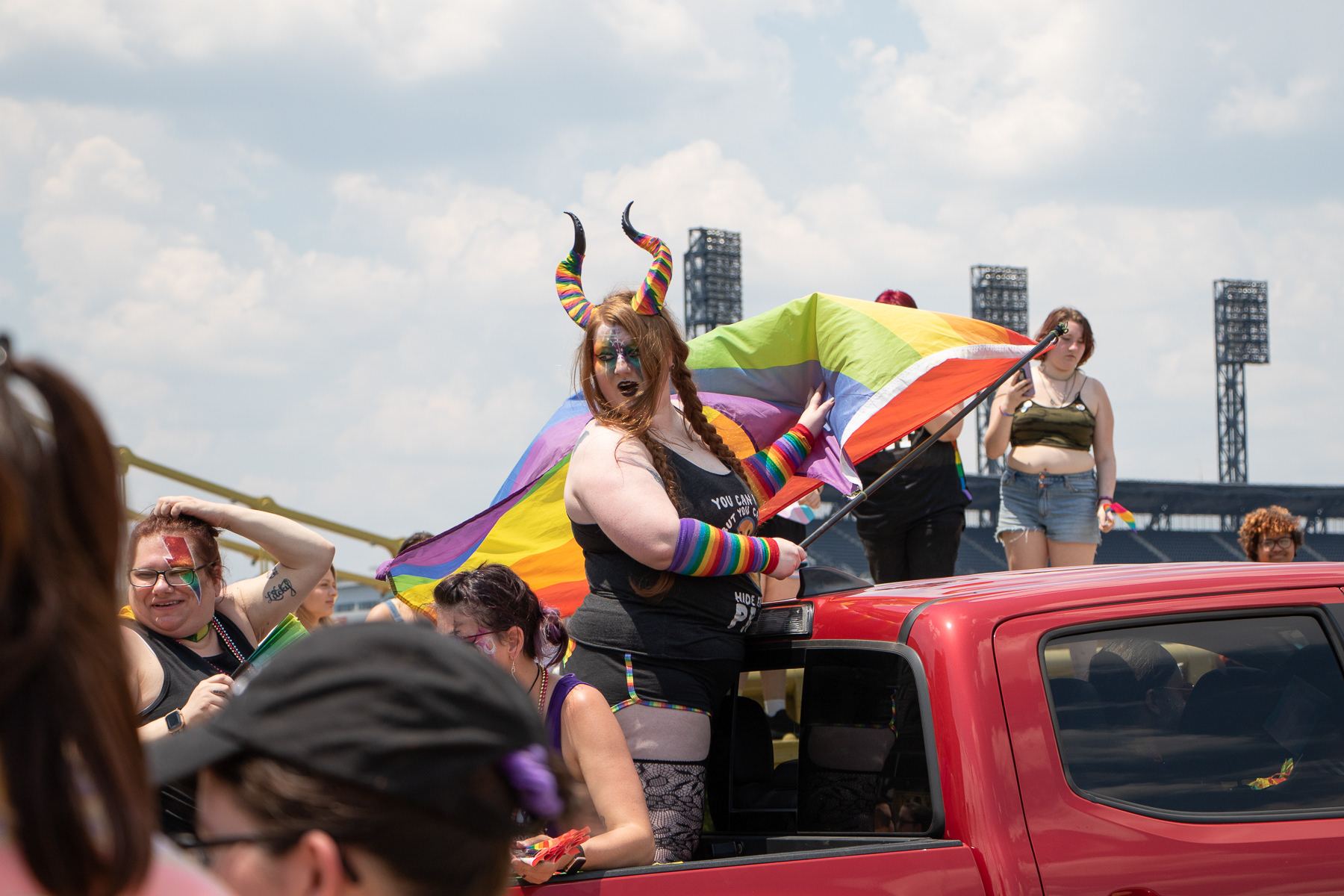 Pittsburgh Pride Revolution parade marchers cross the Andy Warhol bridge to attend a celebration at Allegheny Commons on June 3, 2023.