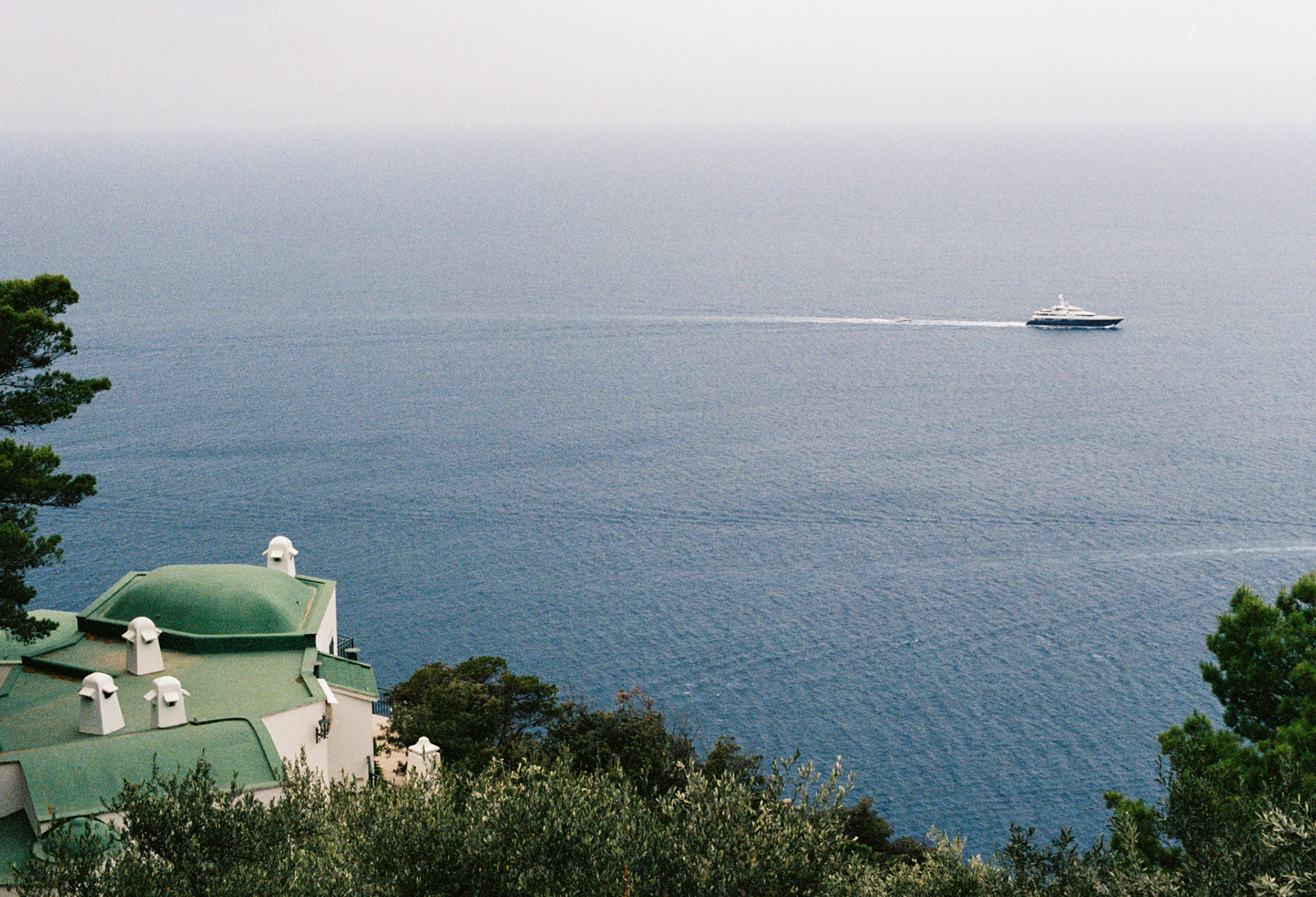 Yacht Passing Cala Moresca