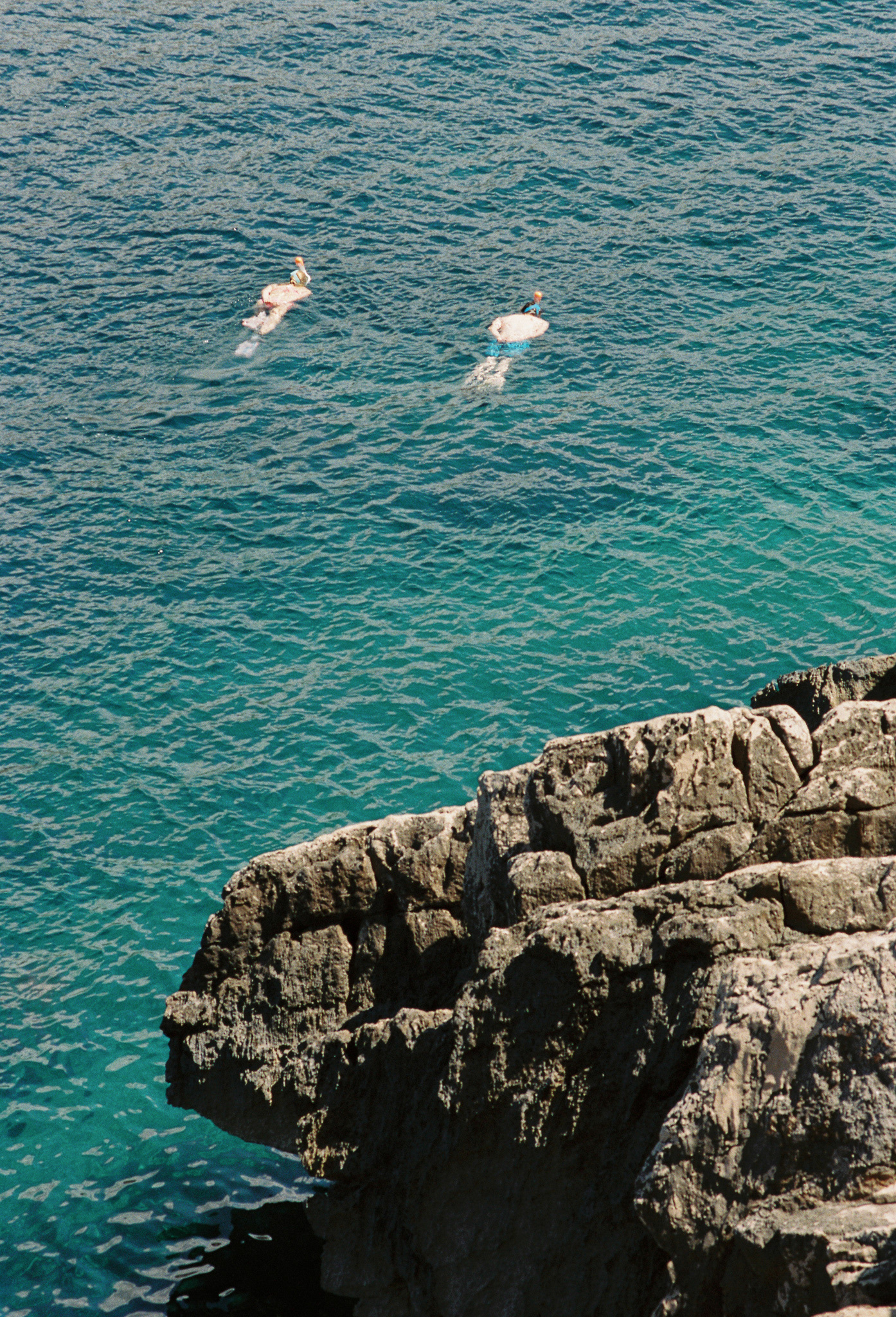 Snorkellers at Sa Ferradura