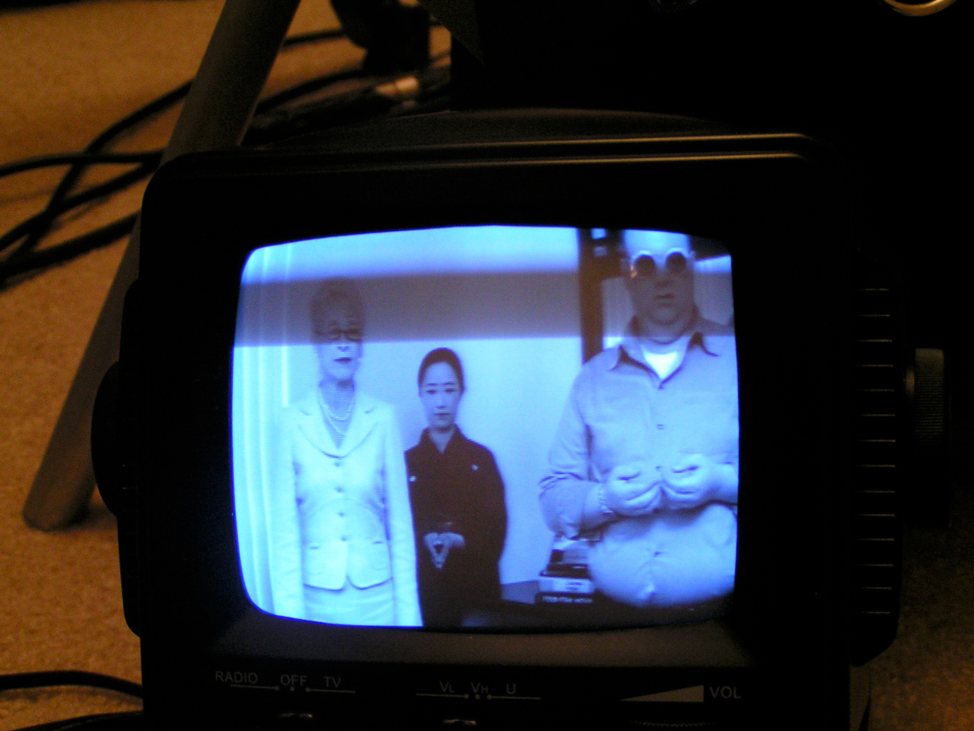 Show it on the monitor! From the set of Spirited. L-R: Bess Klawansky, Eriko Nakano Gardiner, Kevin High