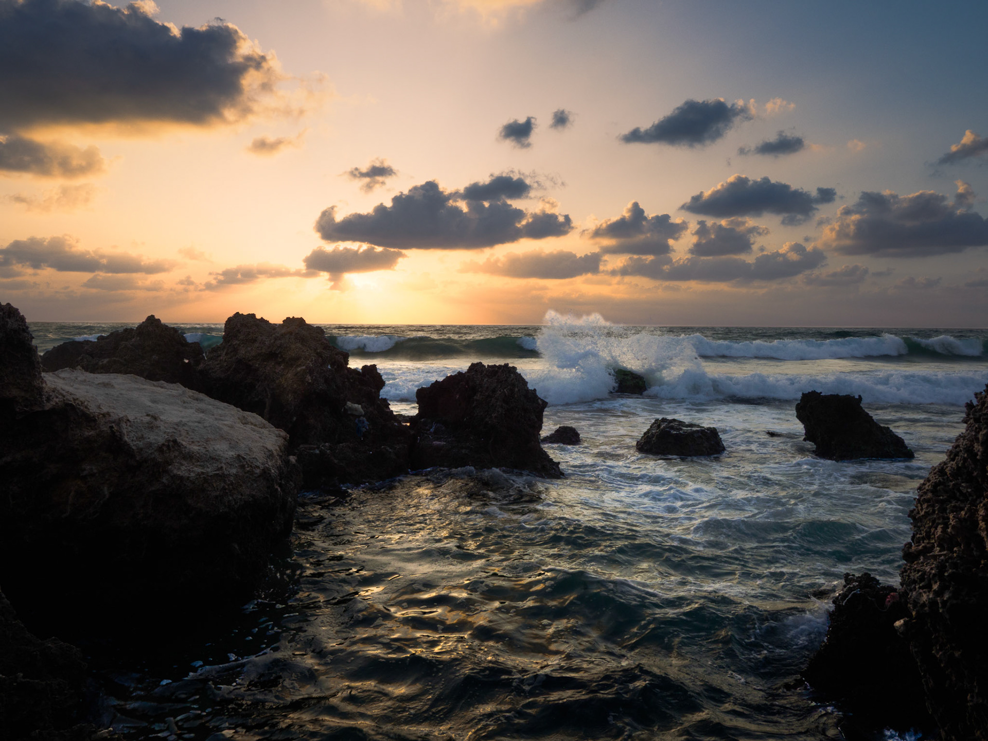 Behind the rocks