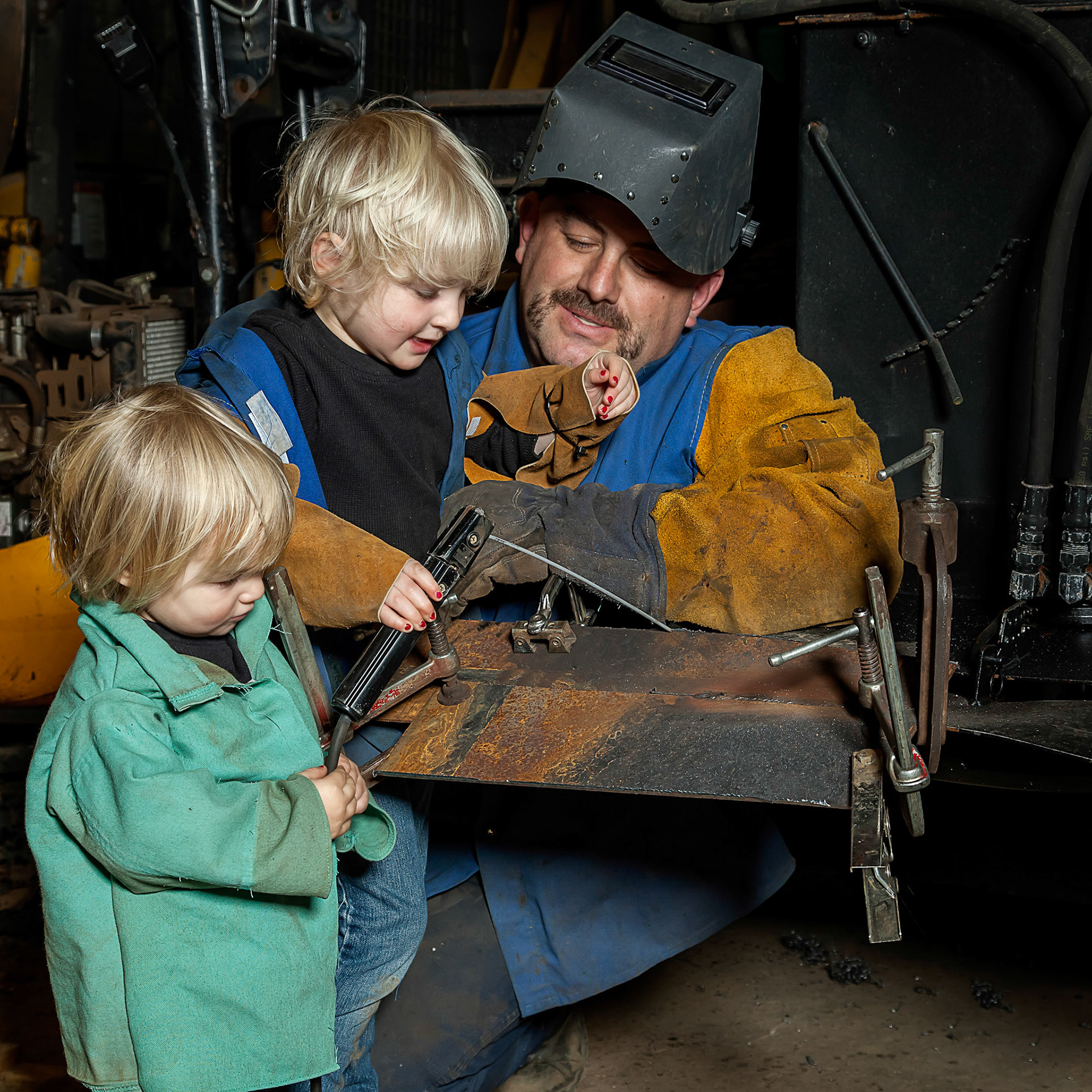 The Welder and his daugthers