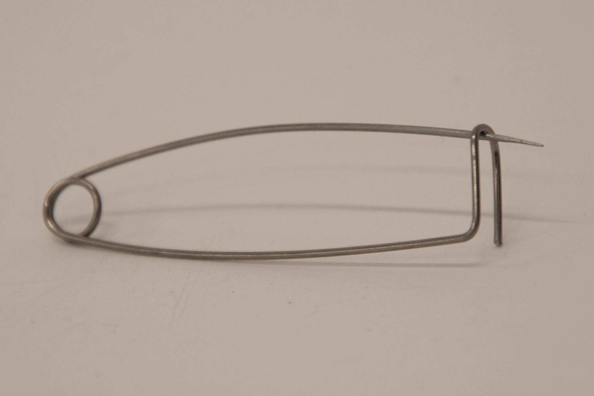 Manipulating wire into a pin