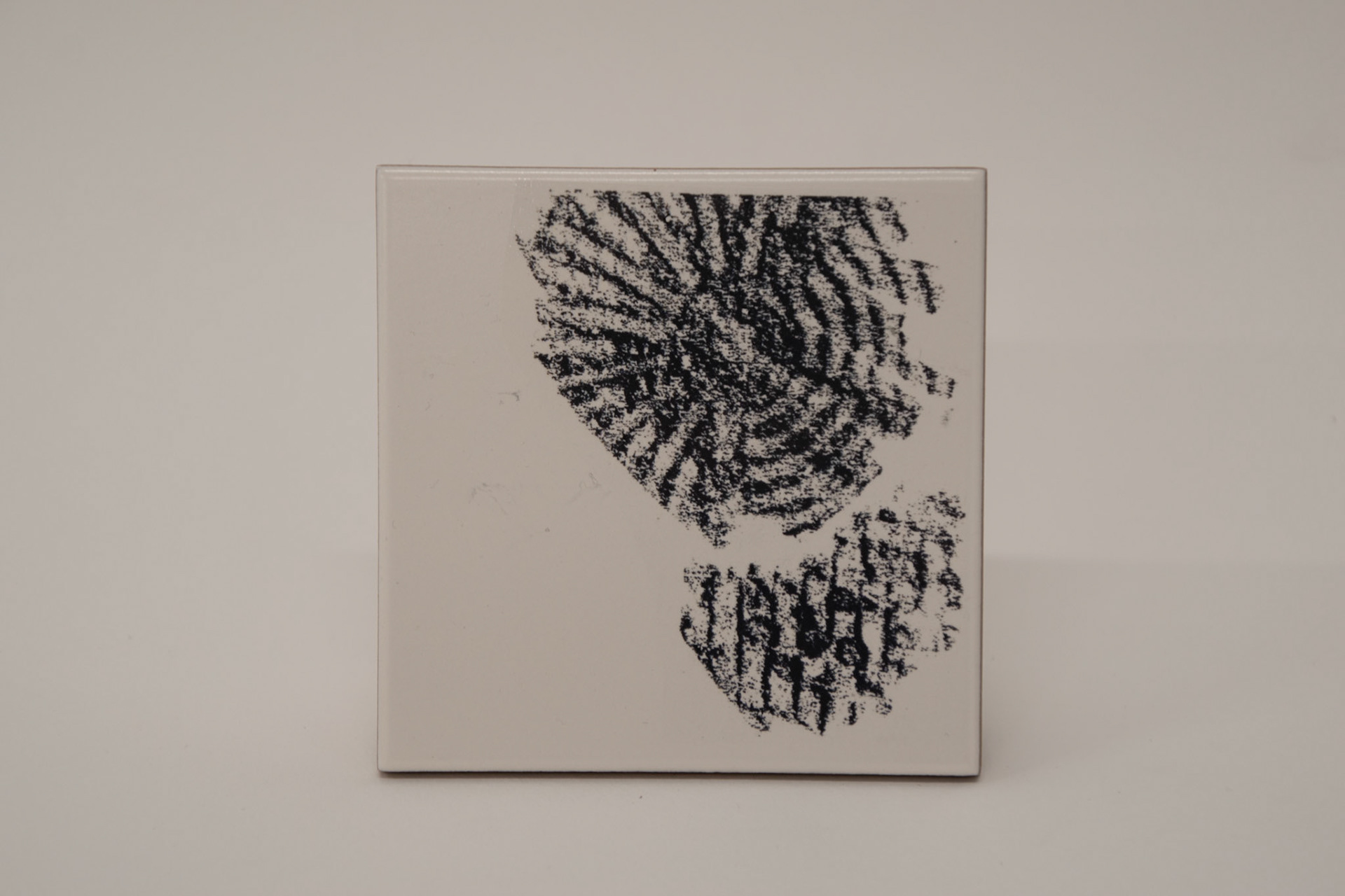 Transfer of frottage onto tile