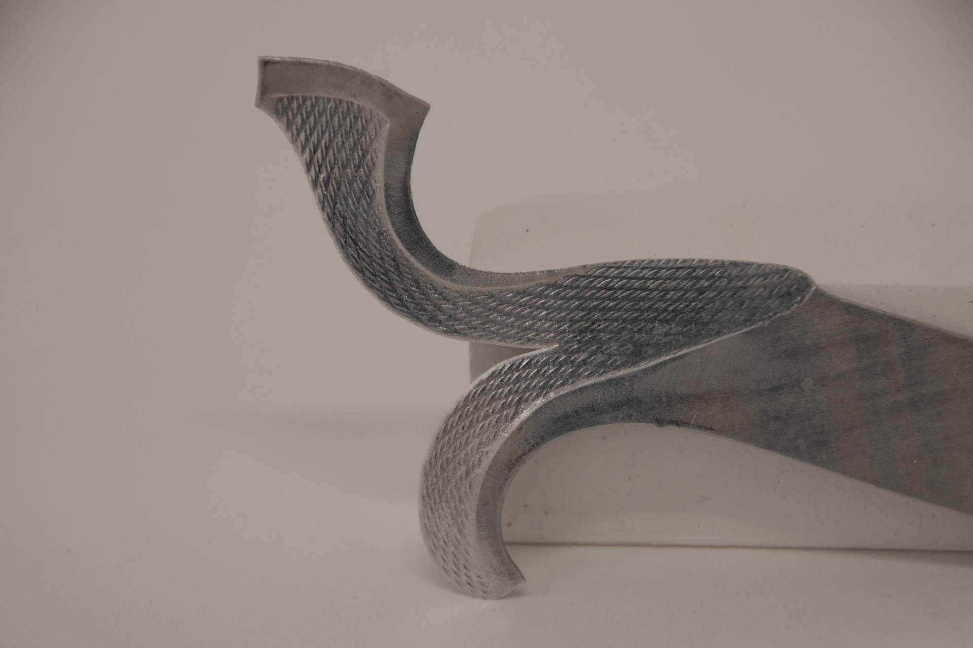 Rolled aluminium using found object