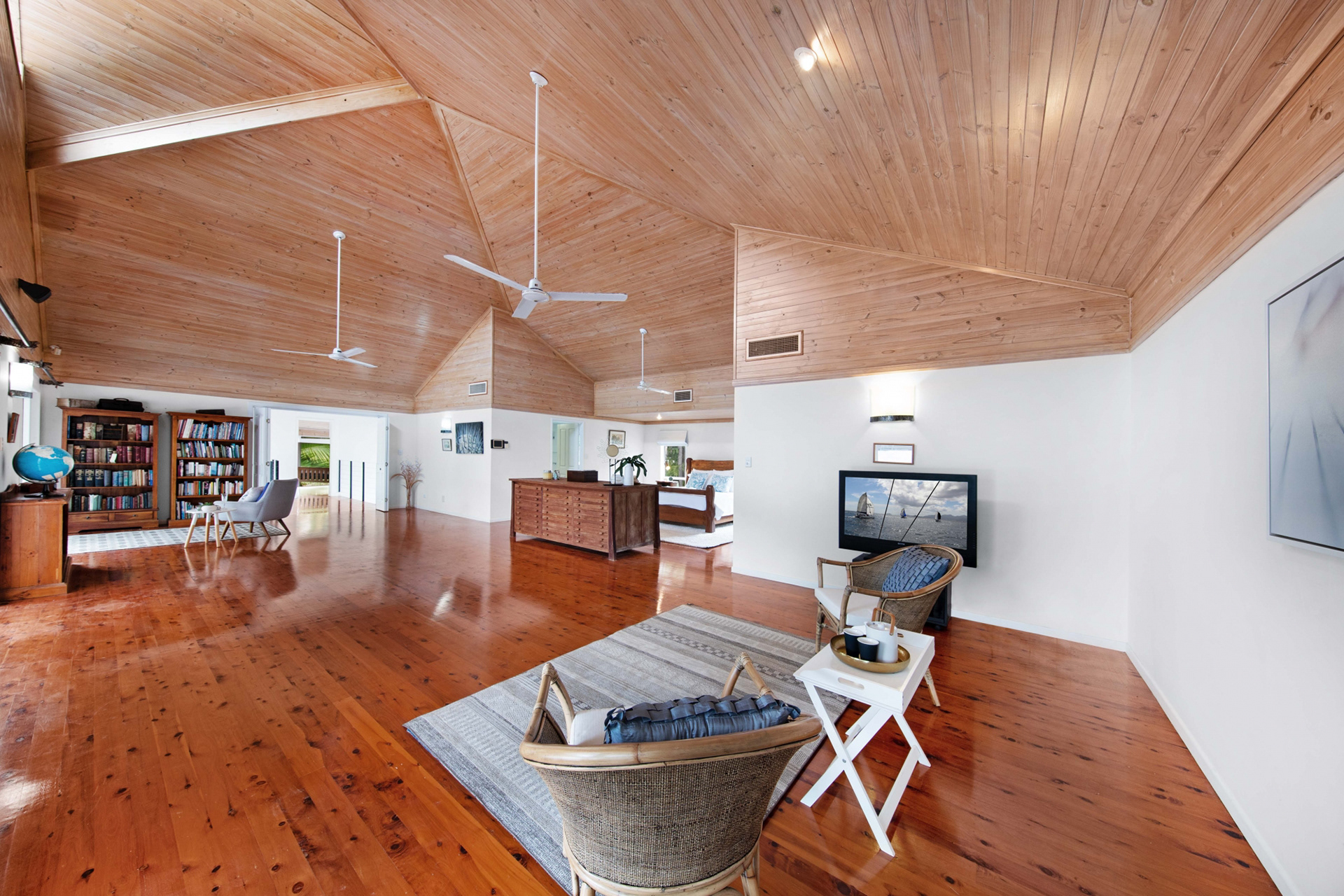 Wide angle lens & lots of lighting for this huge wooden room