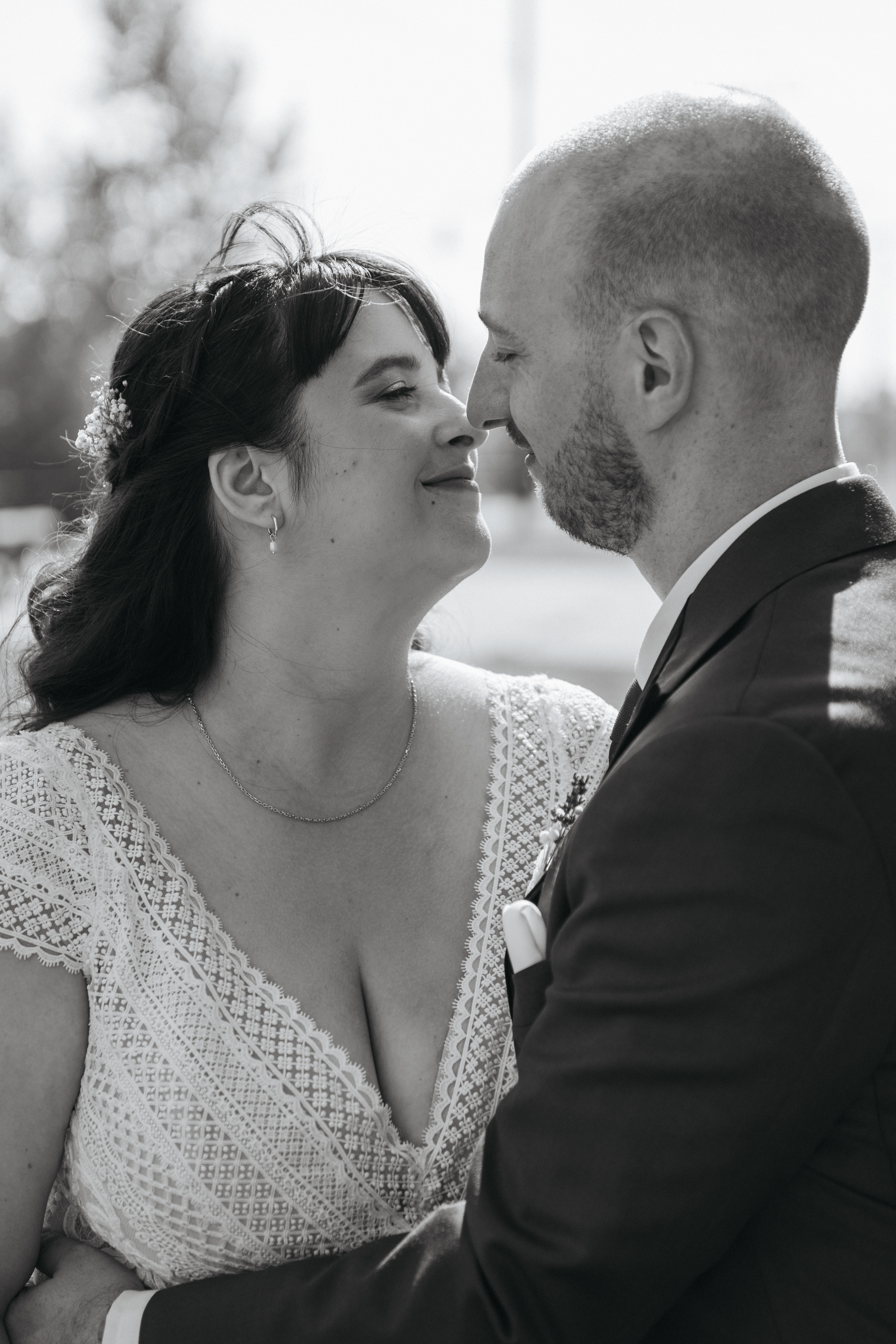black and white photo of couple staring lovingly at each other, intimate, closeup, wedding day photo