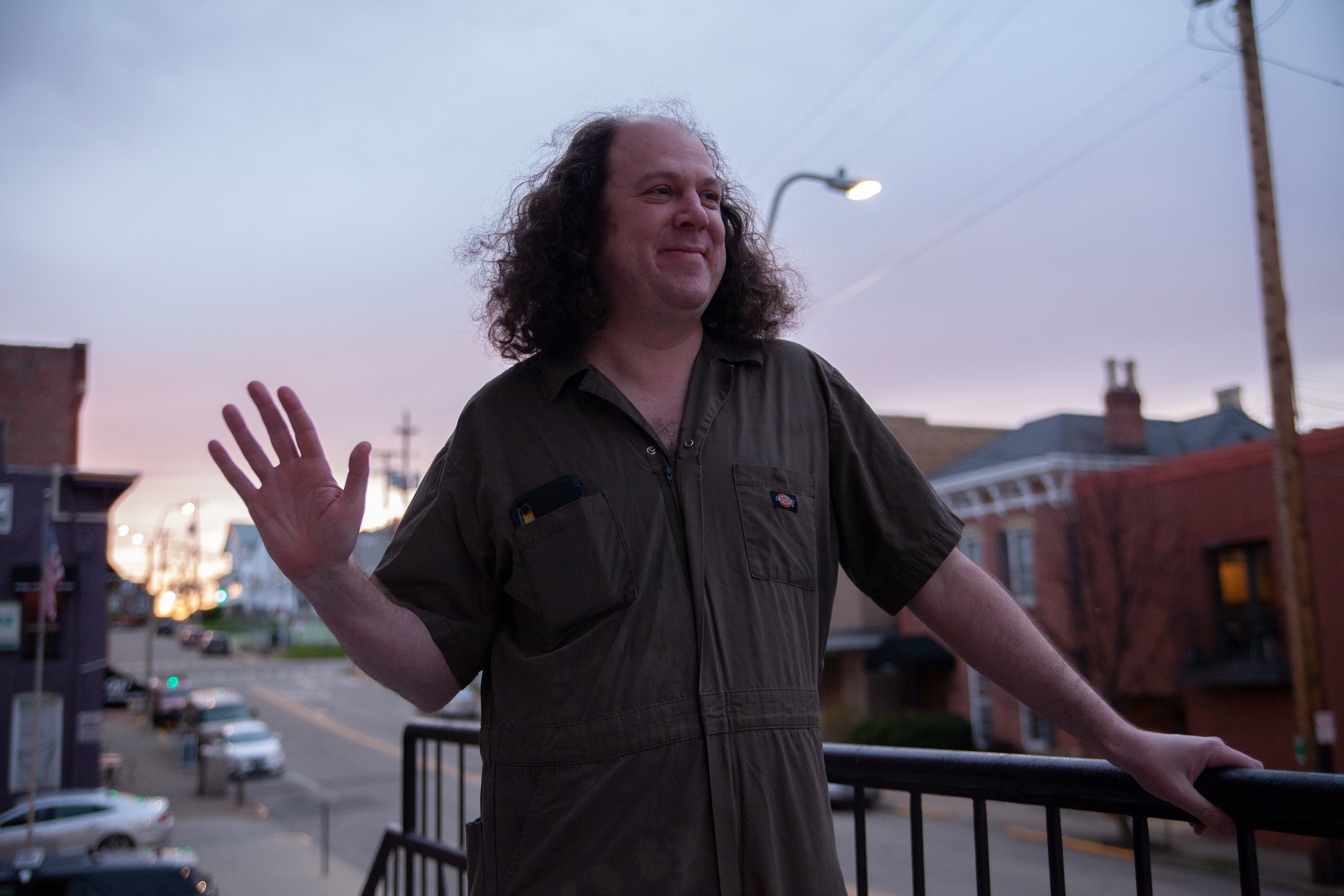 Michael Bart, known as DJ Barticus, poses for a portrait outside of the Athens County Courthouse, March 16, 2024, in Athens.