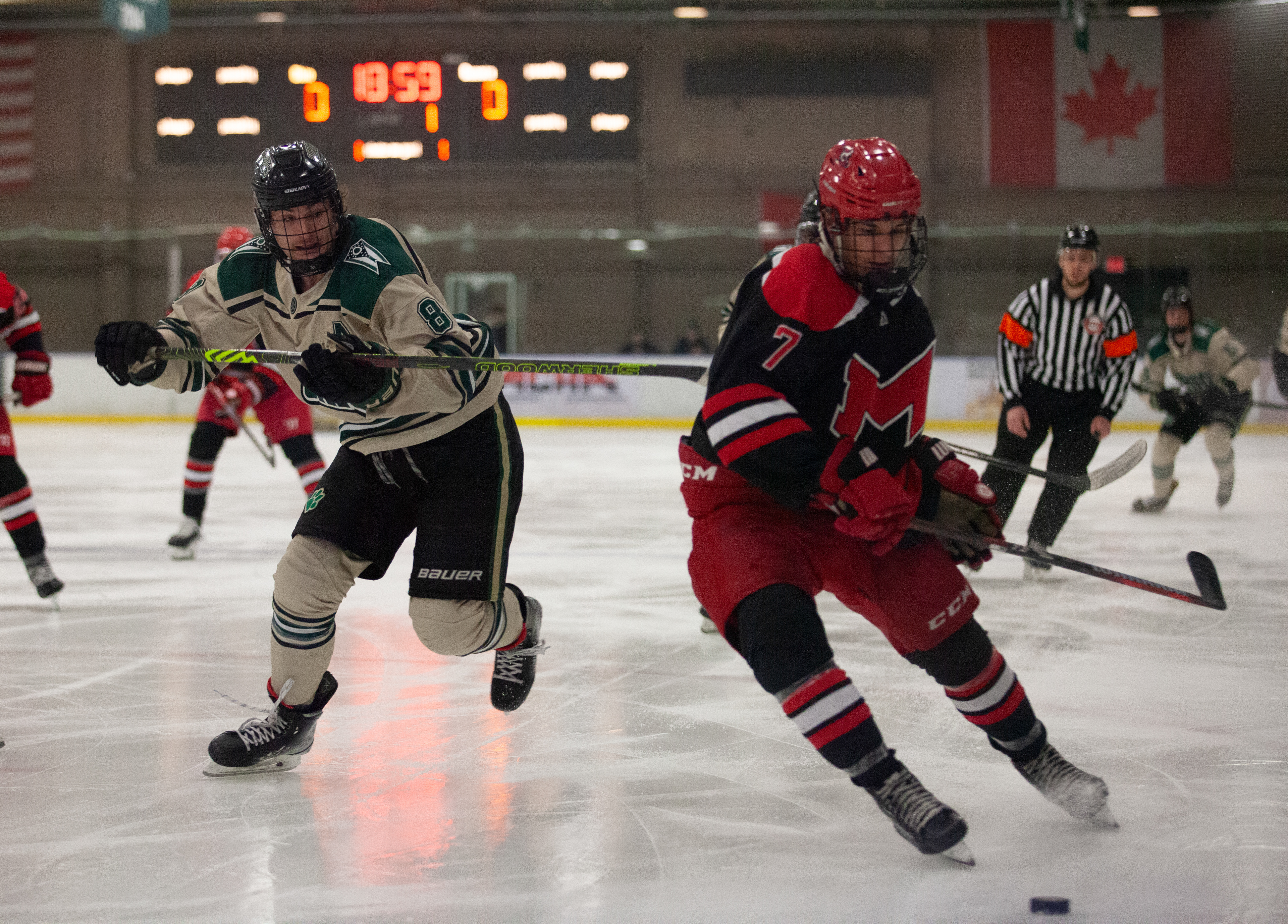 Ohio forward, Luc Reeve (8),  going after the puck with Maryville defense, Ben McArthur (7), during a game against Maryville University in Bird Ice Arena, Jan. 27, 2024 in Athens, Ohio.
