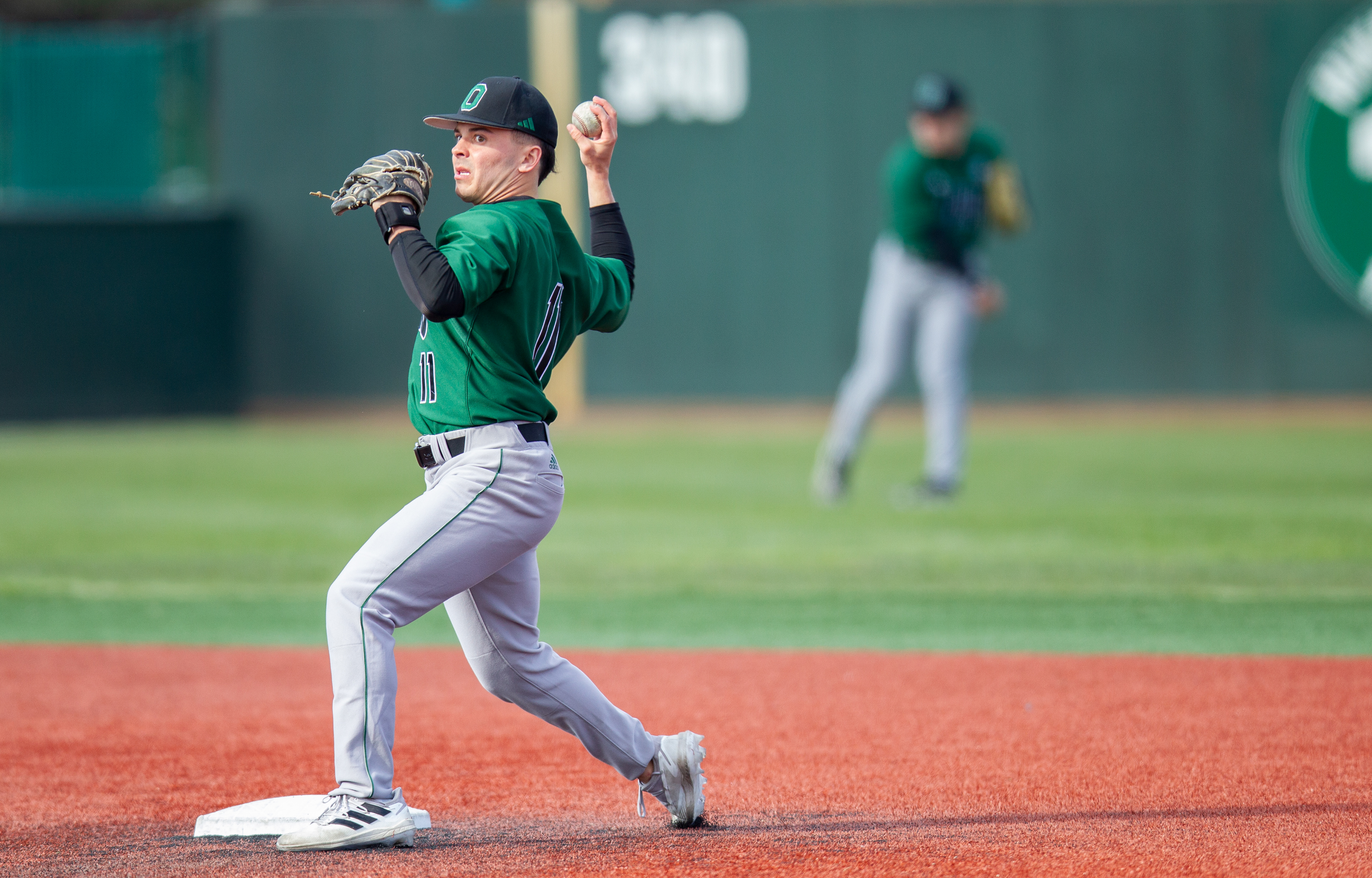 Ohio infielder, Billy Adams (11), steps to throw the ball from second base inbetween innings during a game against Central Michigan at Bob Wren Stadium, March 23, 2024, in Athens.
