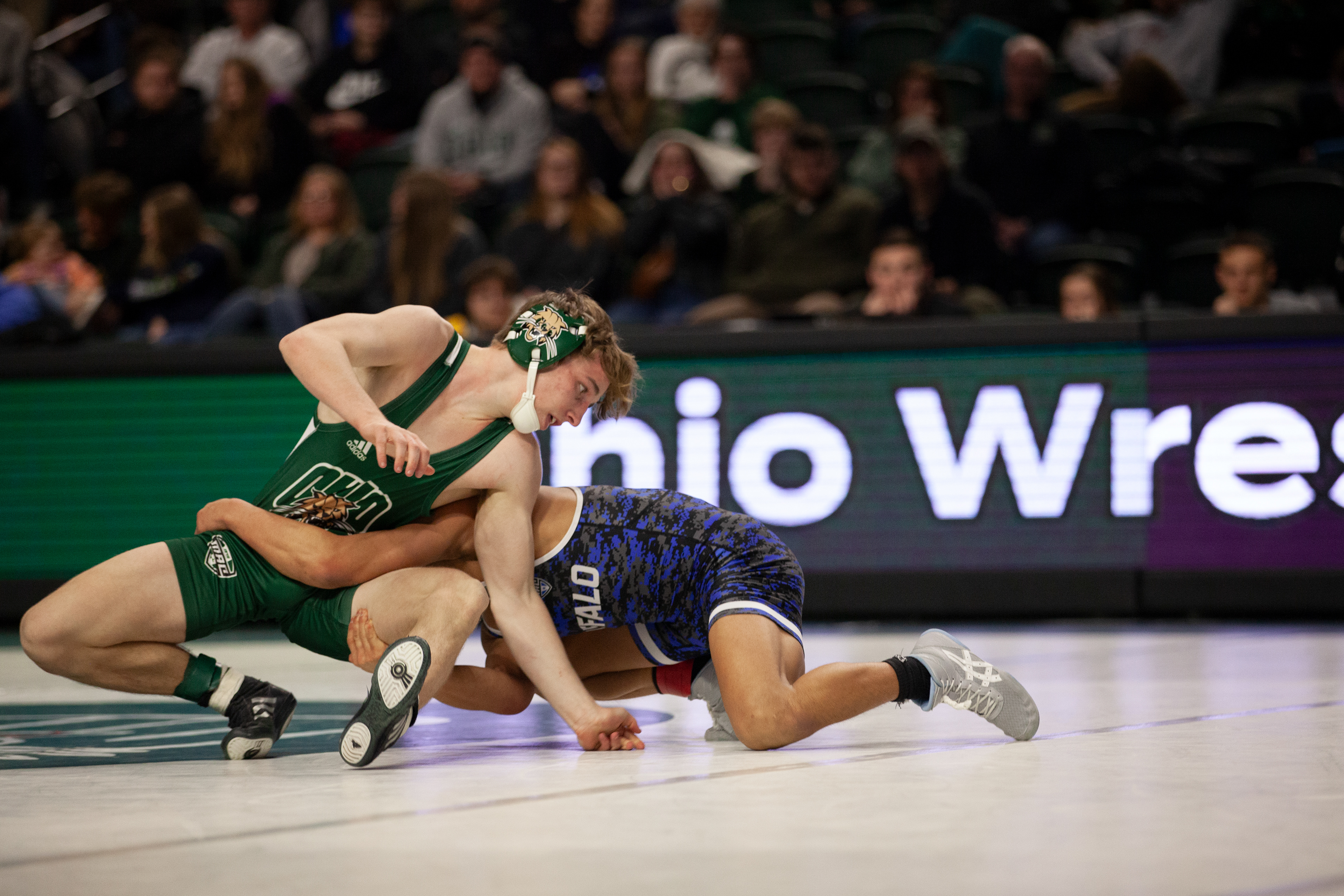 Ohio wrestler, Ryan Meek, wrestling in the 125 pound weight class dual match against Buffalo at The Convo, Feb. 24, 2024 in Athens, Ohio.