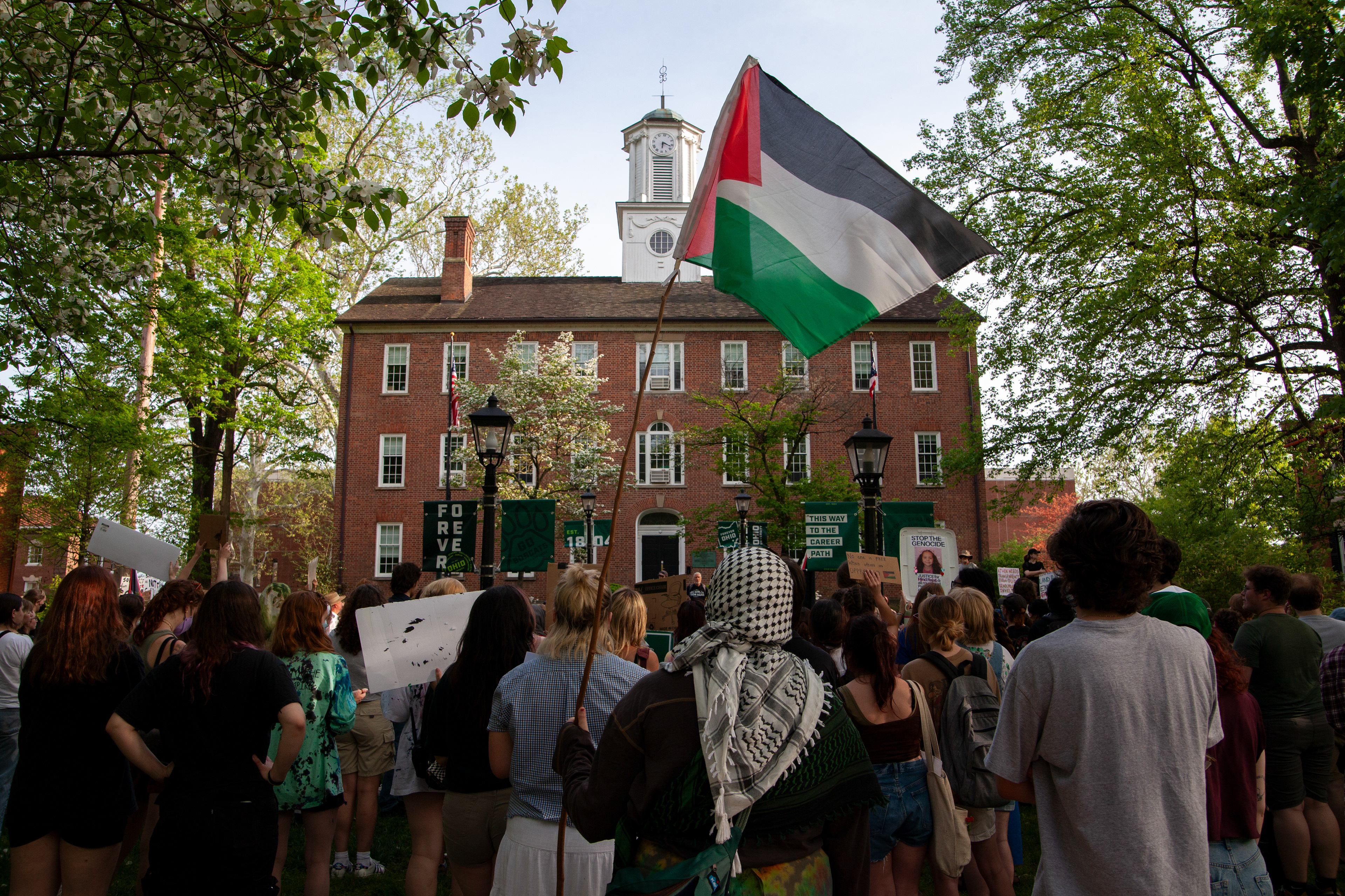 Protestors gather on College Green outside Cutler Hall at a protest for Gaza organized by Students for Justice in Palestine Ohio University, May 1, 2024, in Athens.