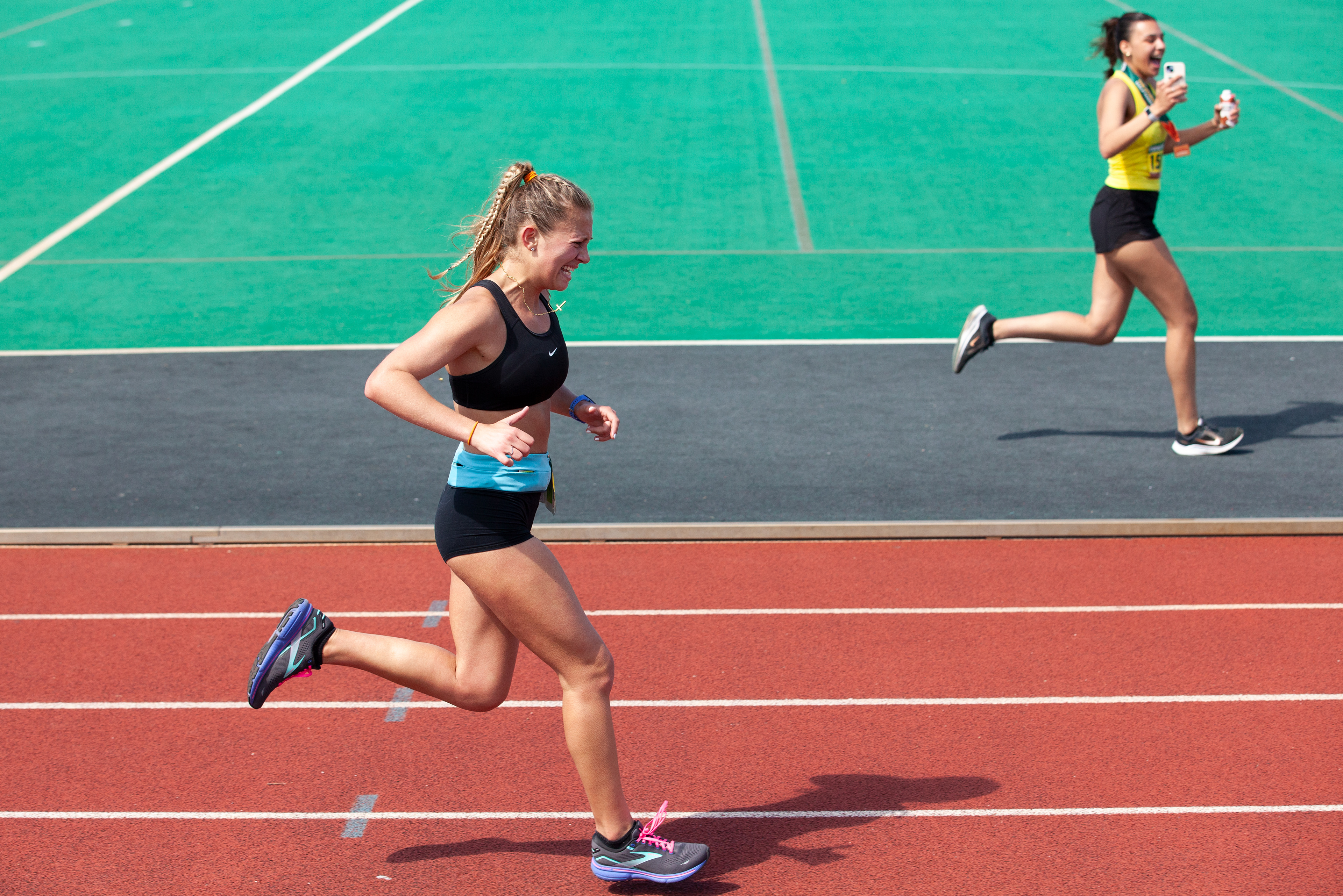 Erika Leimkuhler runs to the finish line in Pruitt Field at the Athens marathon, April 14, 2024, in Athens.