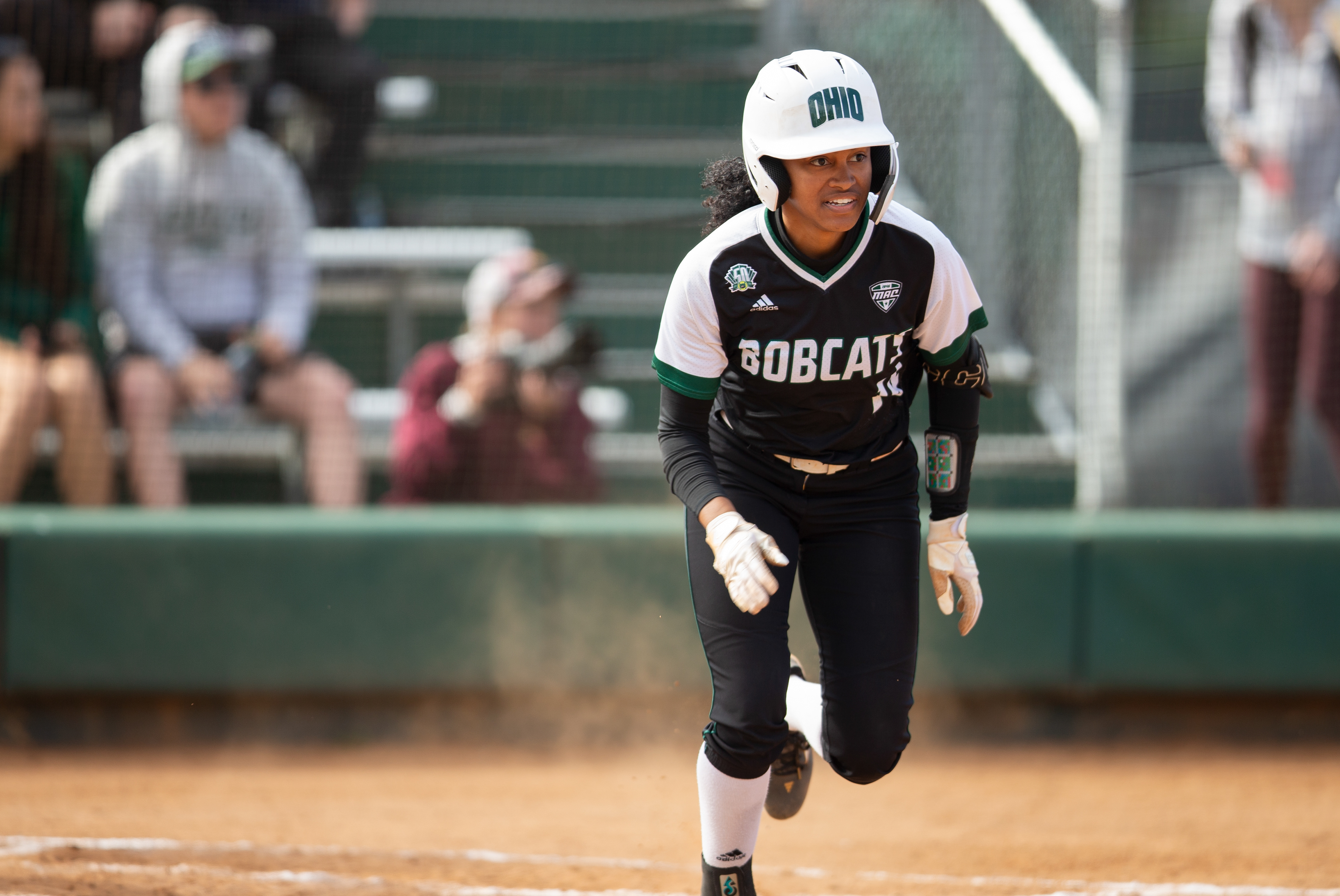 Ohio outfielder, Yasmine Logan (14), begins to run to first base during the second game of the doubleheader against Central Michigan at Ohio Softball Field, March 29, 2024, in Athens.
