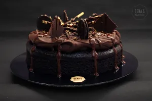 The ultimate comfort dark chocolate cake. Rich, moist chocolate cake topped with decadent Belgian couverture dark chocolate ganache. 
