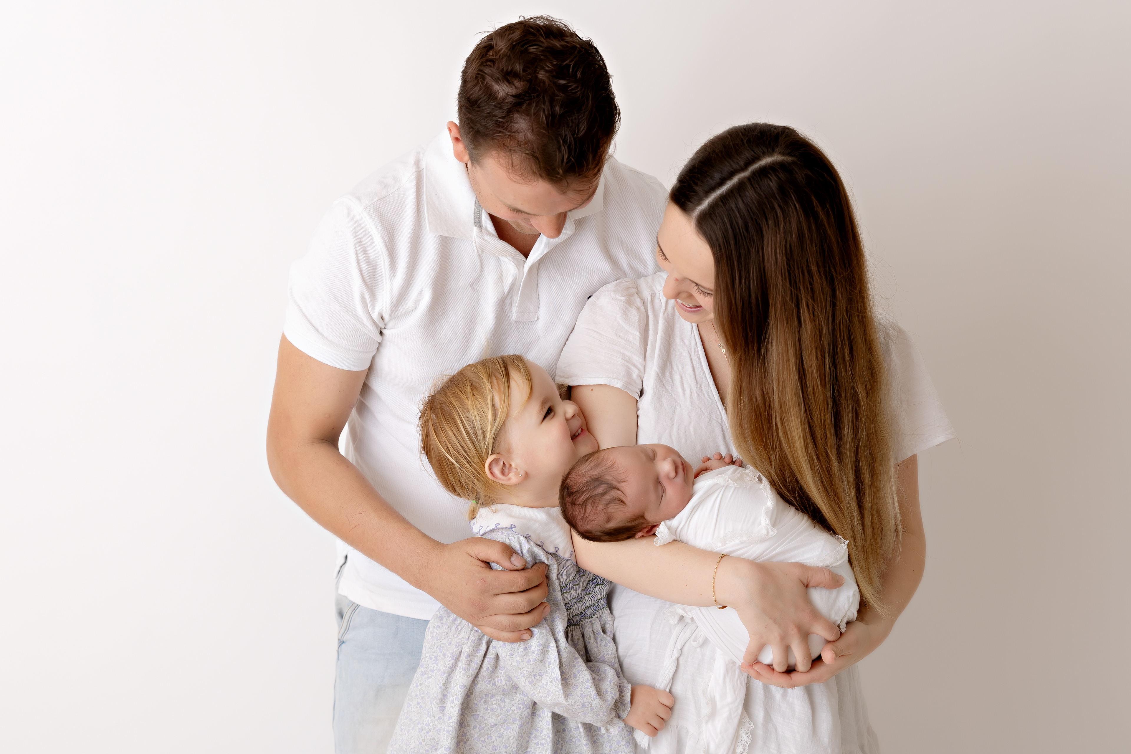 older baby milestone photography, family portraits Tauranga, cake smash photographer Tauranga, modern cake smash Papamoa, lifestyle beach family session, first year milestone collective, 6 month sitter session, toddler portrait studio