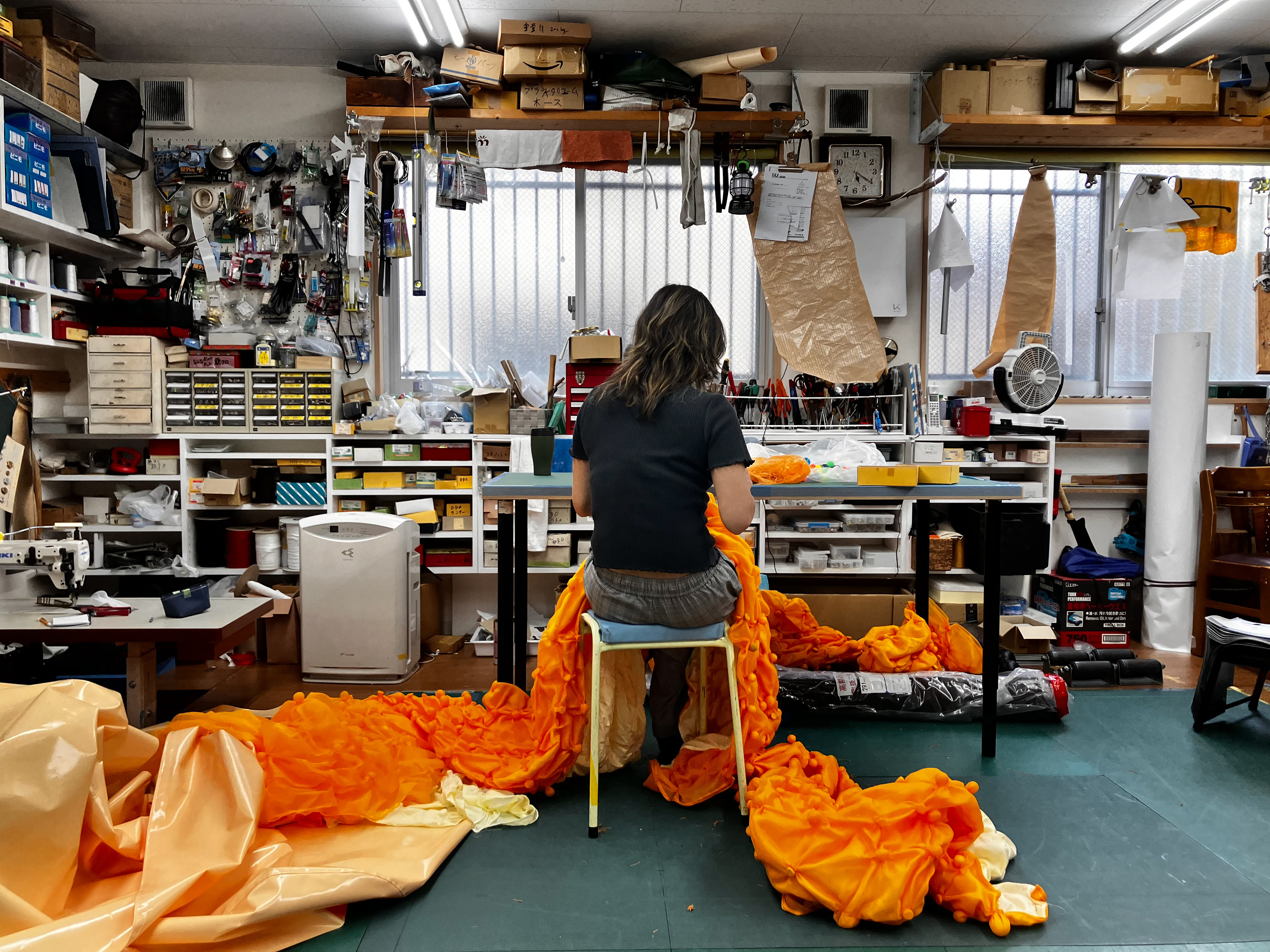 untying rubber bands from "SHIBORI" fabric
