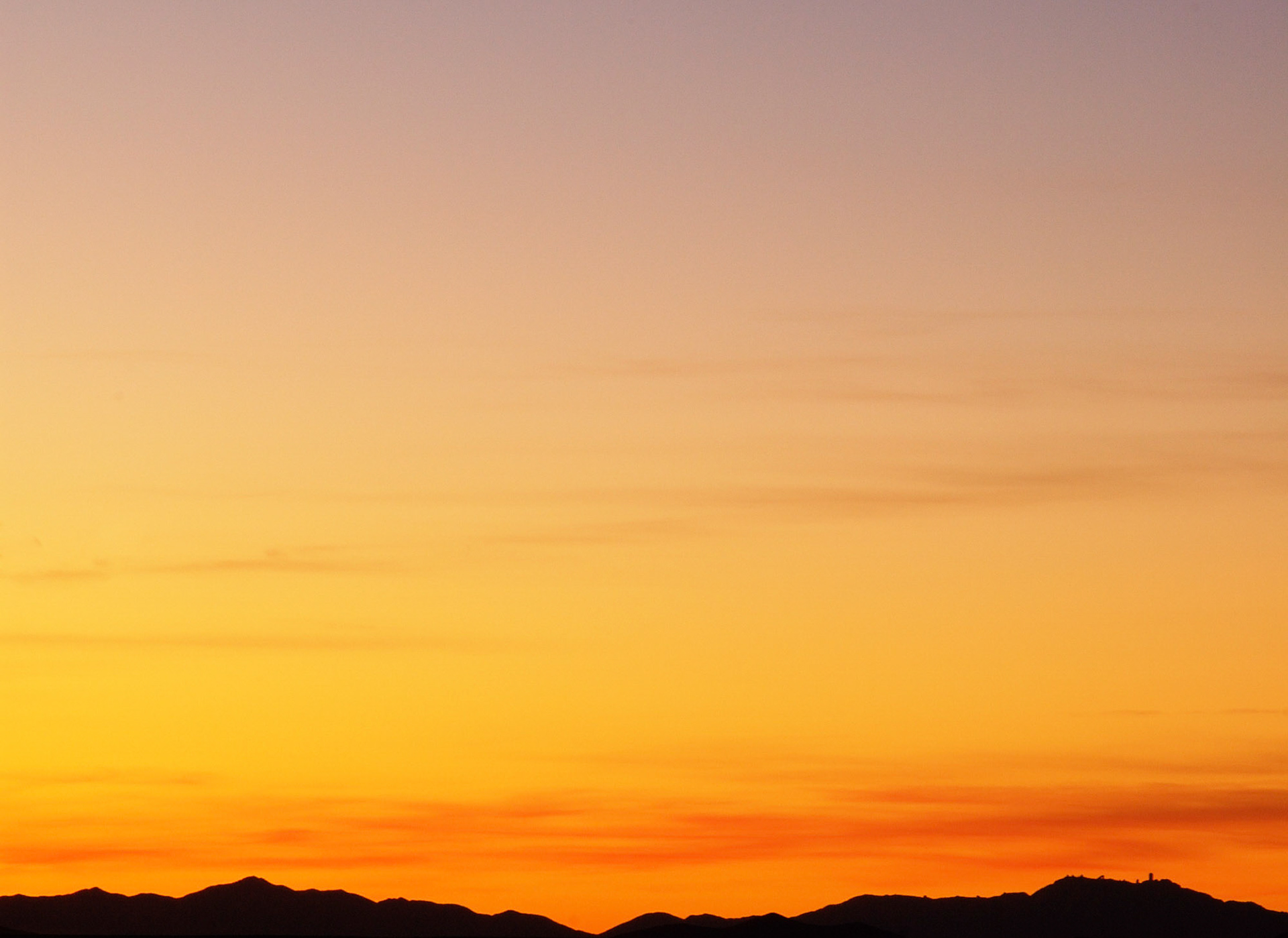 A dramatic sky over a mountainscape in southeast Arizona.