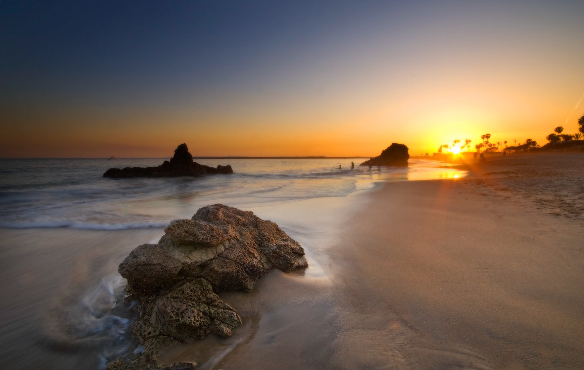 There's something about the sun's last light that moves me. As I stood there with sand between my toes on the beach at Corona Del Mar, framing this shot, I was so captivated by the beauty before me I forgot to take the shot. I just stared into the sun for a minute or two.