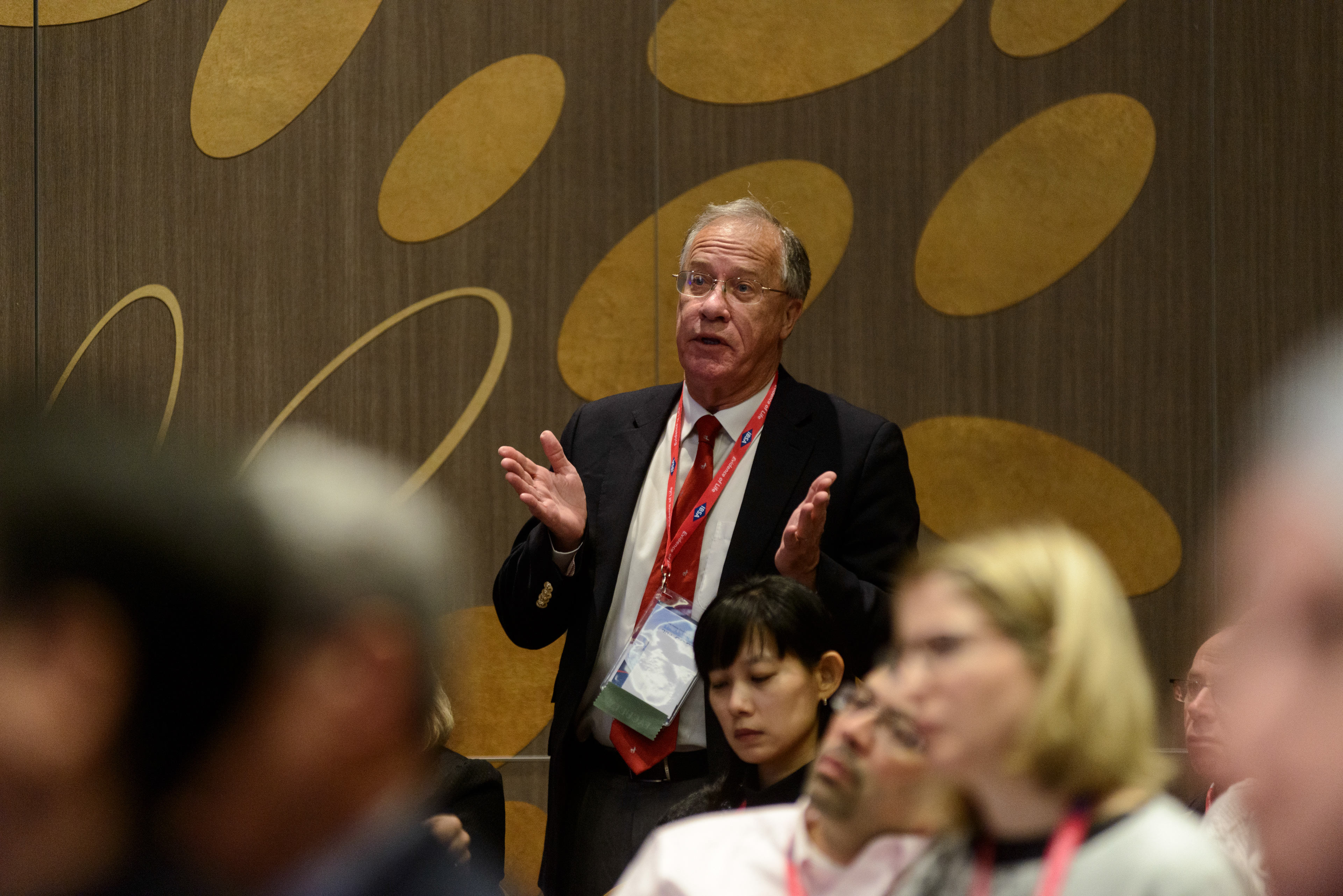 A participant asking a question during Professor Emmanuel Bujold"s presentation on "Prevention of Pre-Eclampsia and IUGR with Aspirin" at the 20th World Congress on Controversies in Obstetrics, Gynecology & Infertility (COGI). Paris, France.