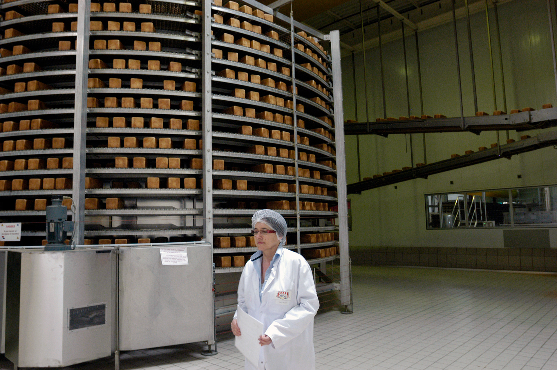 Loafs of American style sandwich bread on the production conveyers at the orginal Harry's factory in Châteauroux.