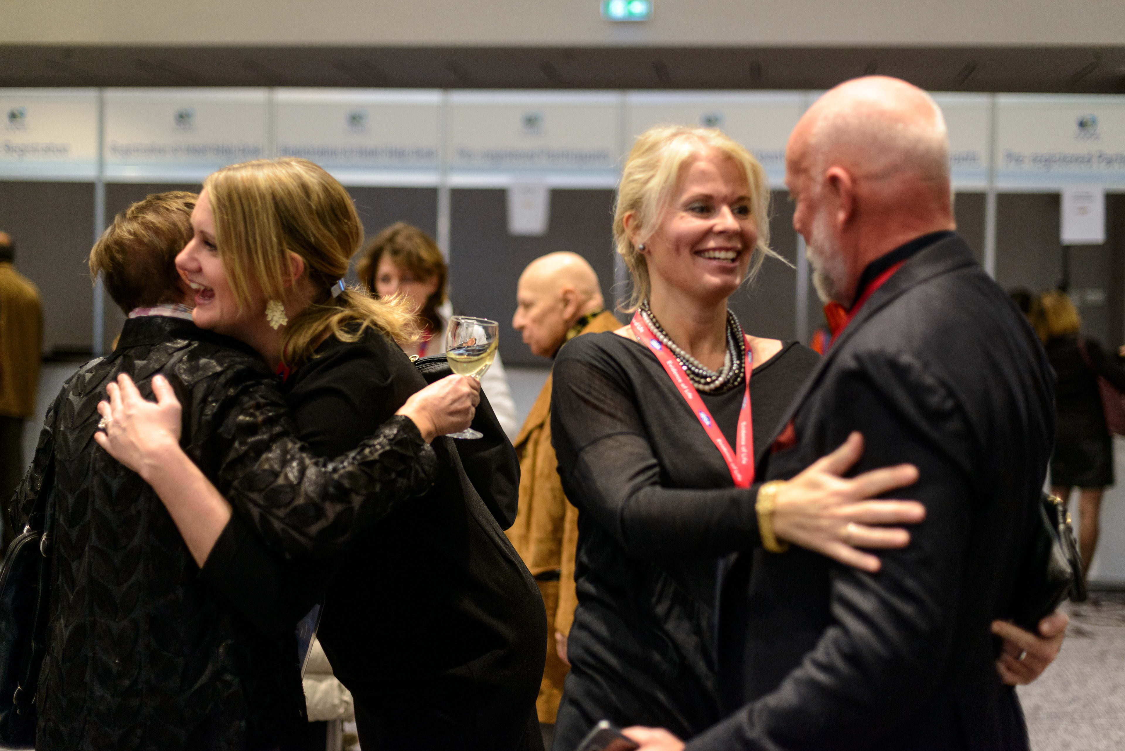 Participants greet each other at the 20th World Congress on Controversies in Obstetrics, Gynecology & Infertility (COGI). Paris, France.