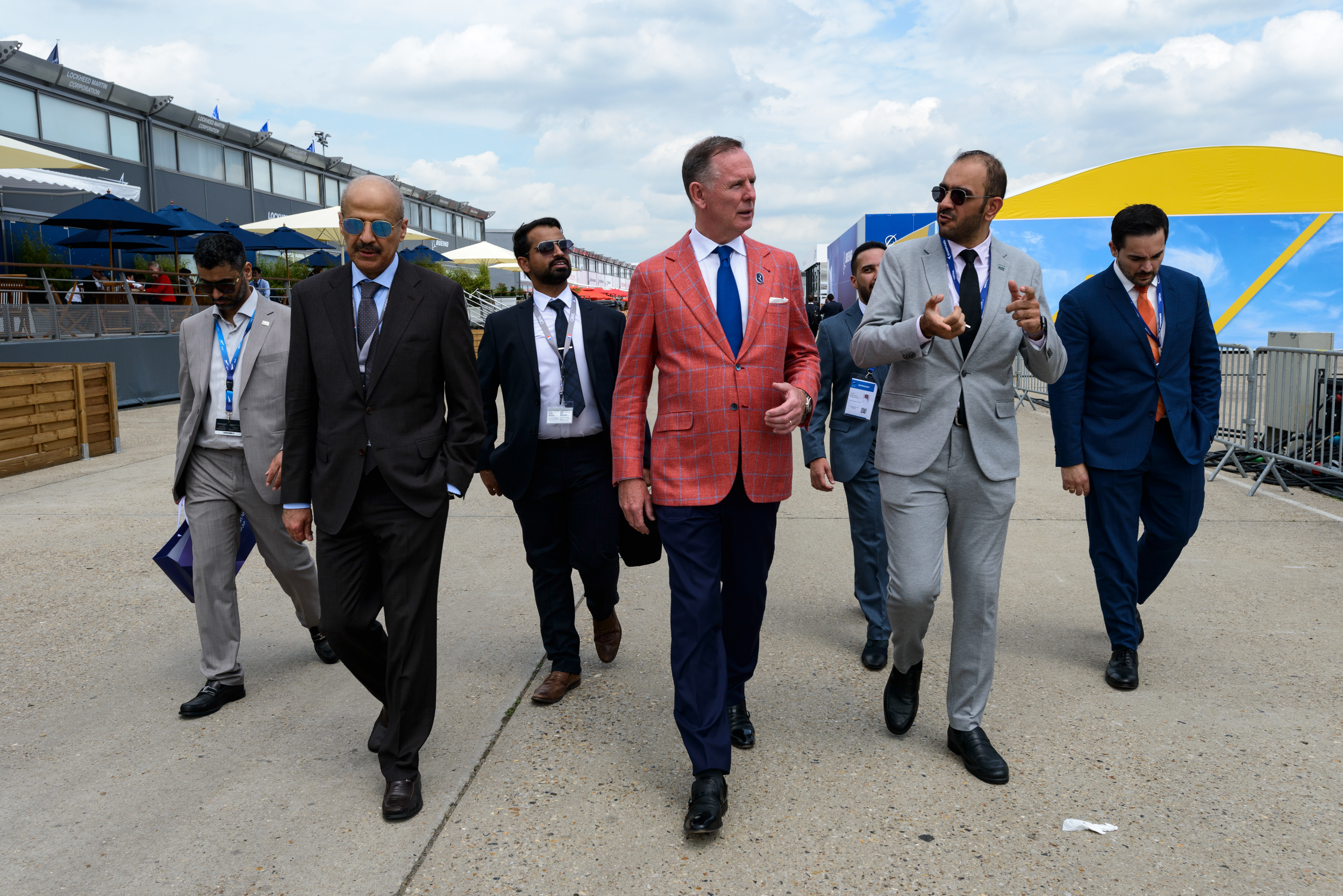 Eng. Mohammed Al-Maghlouth (left), CEO of the Riyadh Aiirports Company, walks with Tony Douglas (center), British business man and CEO of Riyadh Air, at the 54th Paris Air show. The delegation is in Paris to promote the Saudi plan for a six-runway mega airport in Riyadh and the the new Saudi Arabian flag carrier Riyadh Air, scheduled to launch in early 2025, part of Saudi Arabia's Vision 2030 Investment plan to diversify its economy away from oil. Le Bourget, France.