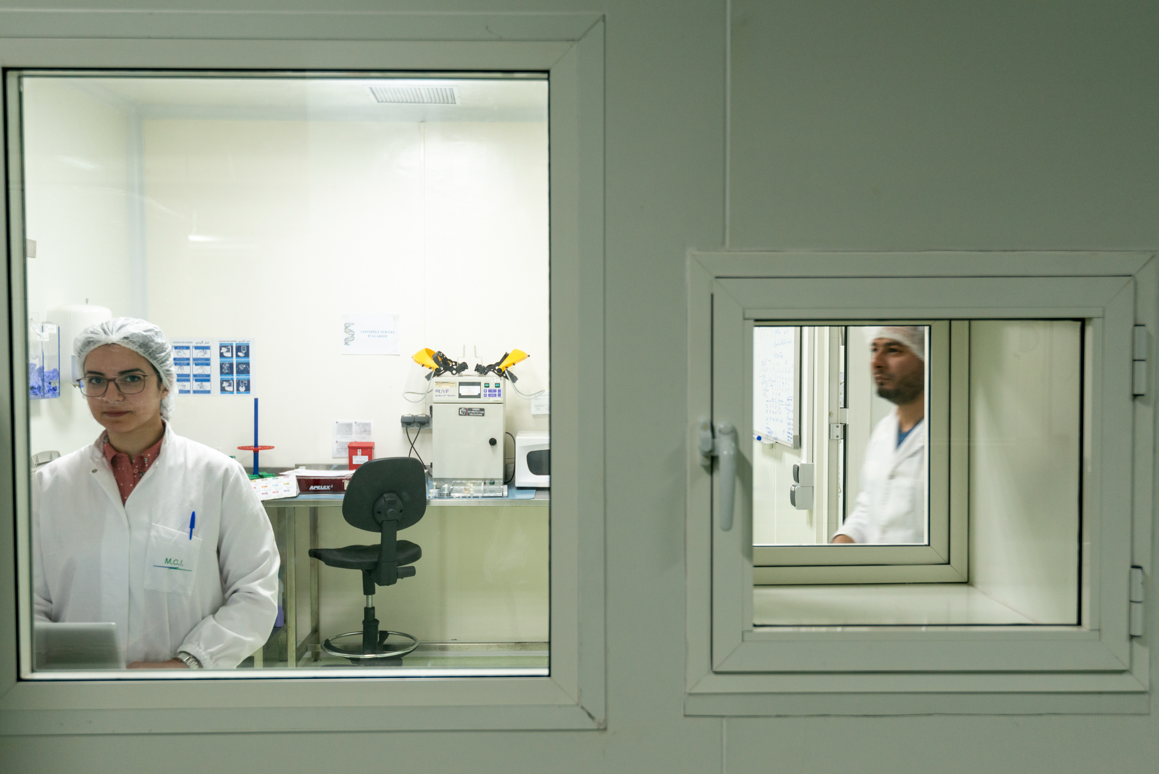 Research technicians Mohammed Jazoule and Lamiai Alami Marrouni working in the molecular biology unit of the MCI Santé Animale laboratory.