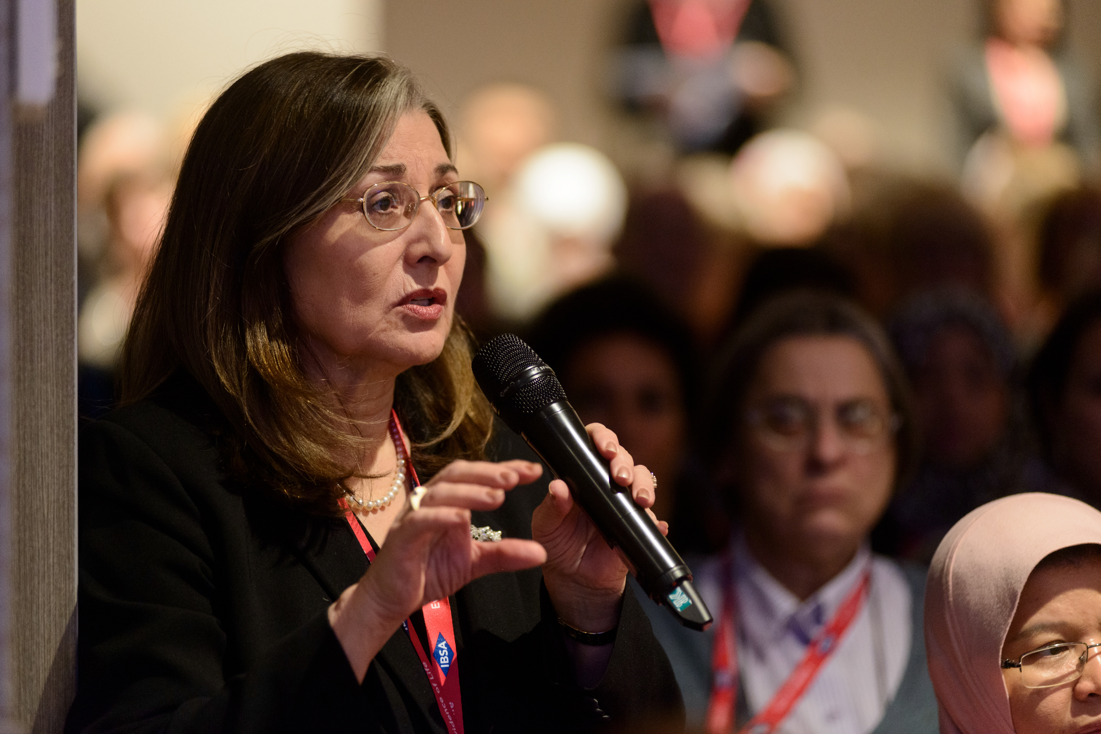 A participant asking a question during Dr. Alessandra Graziottin's presention on "Vaginal Application of Sex Steroids: The Future in Women's Health? What are the Limitations?" at the 20th World Congress on Controversies in Obstetrics, Gynecology & Infertility (COGI). Paris, France.