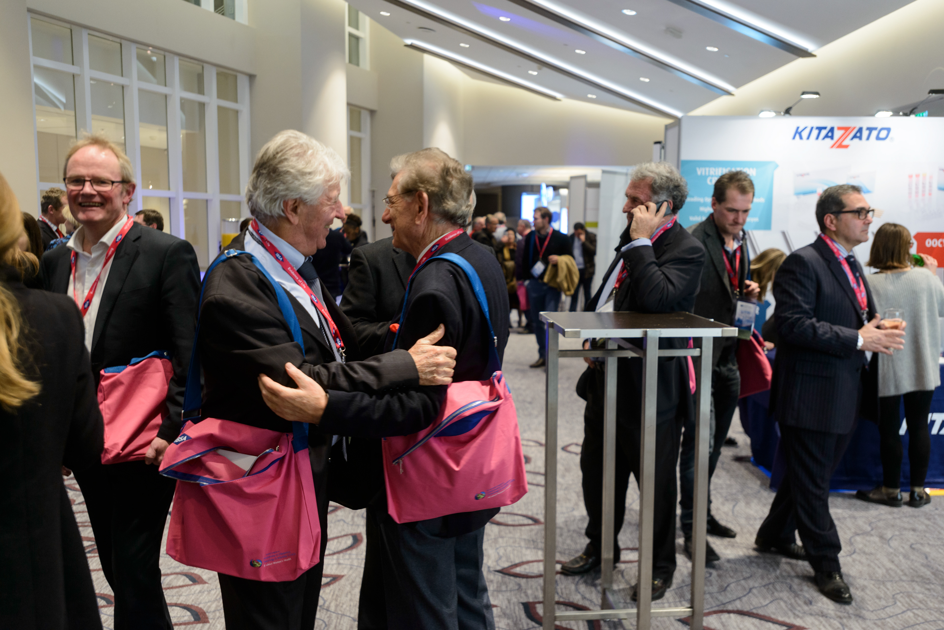 Participants greet each other at the 20th World Congress on Controversies in Obstetrics, Gynecology & Infertility (COGI). Paris, France.
