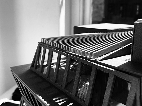 WOODEN BEAMS PROVIDING SHADE TO THE 3RD FLOOR INDOOR PERFORMANCE SPACE