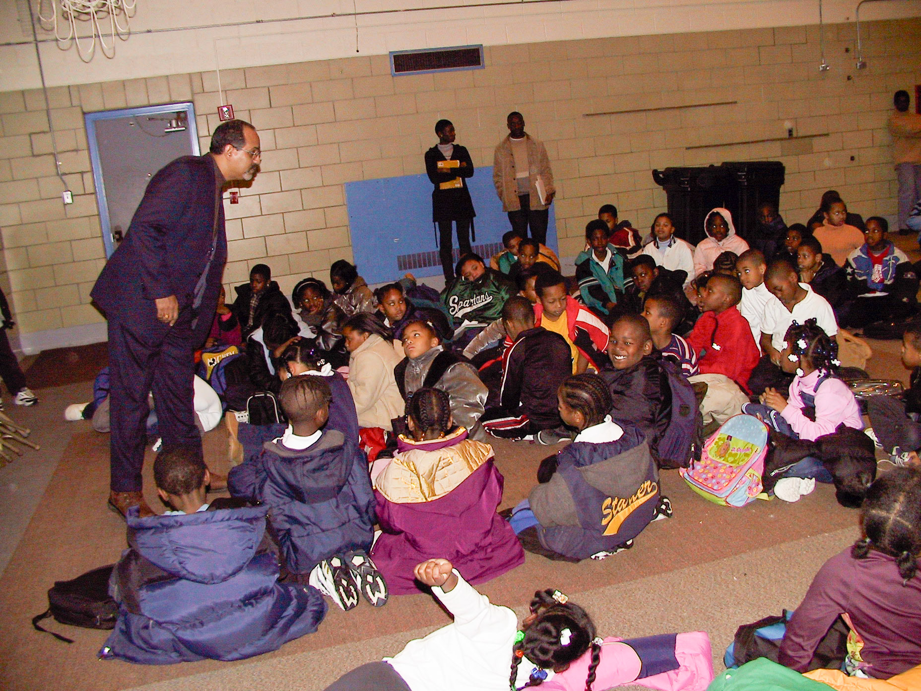 Rev Michael C Murphy having a discussion with Shabazz Academy students, Lansing, MI