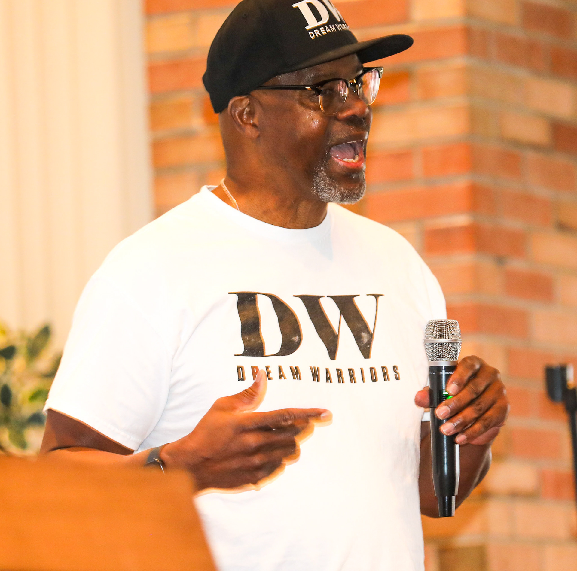 Mike Garland, former Michigan State University assistant basketball coach speaking at male mentoring conference, Lansing, Michigan