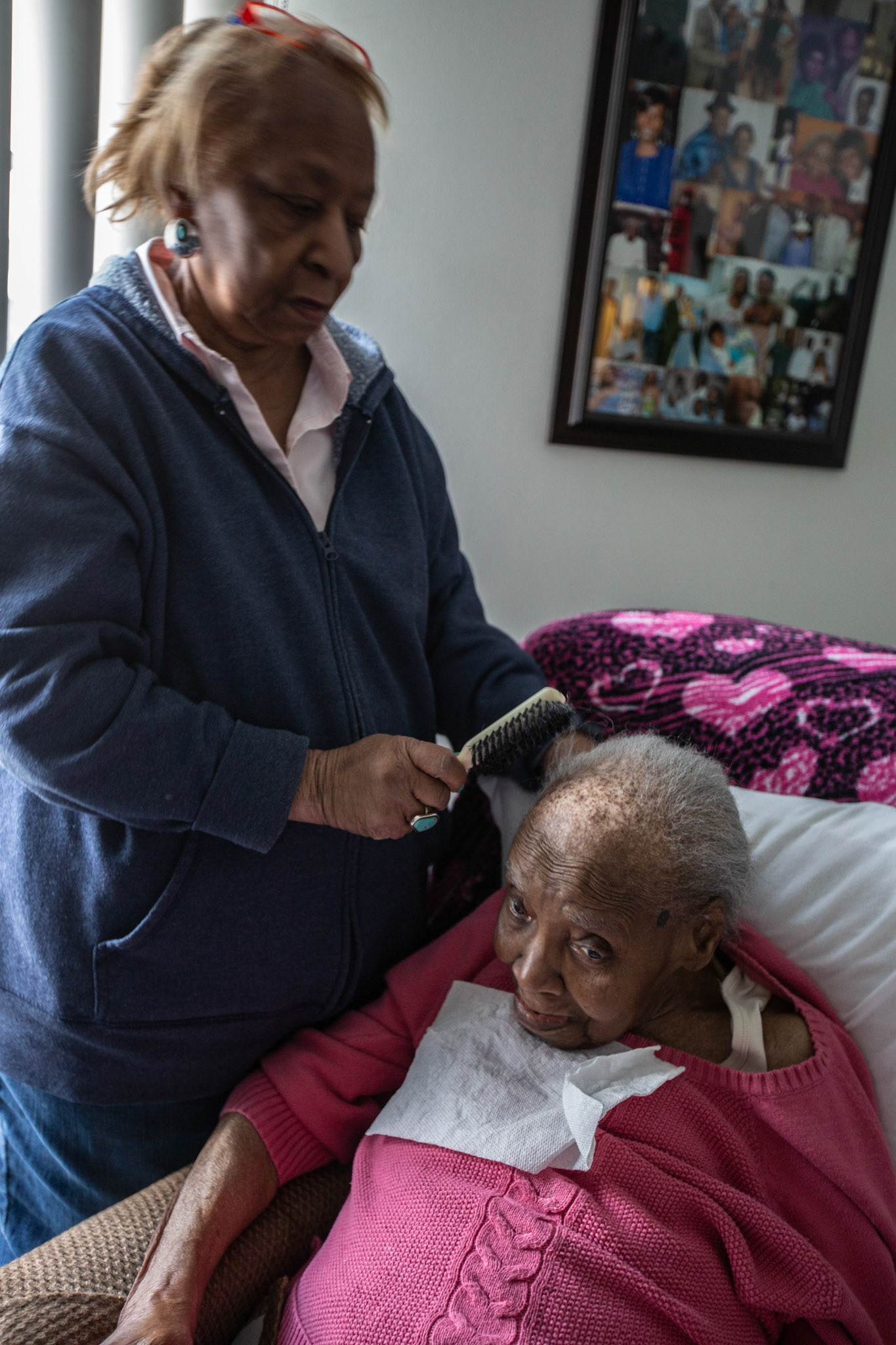 My sister Pat  brushing Aunt Essie's hair