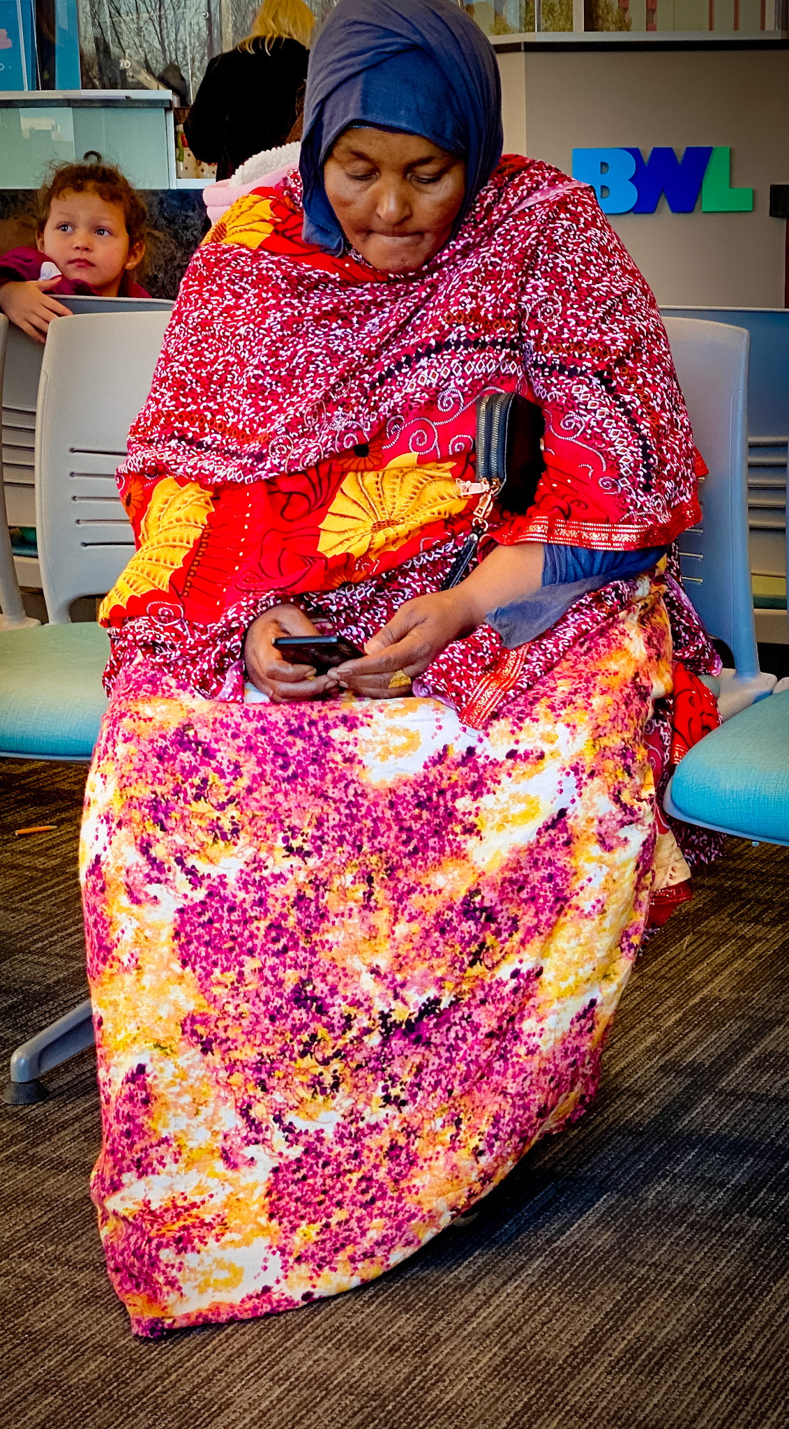Waiting for Her Number To Be Called