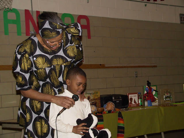 African storyteller with Shabazz Academy student