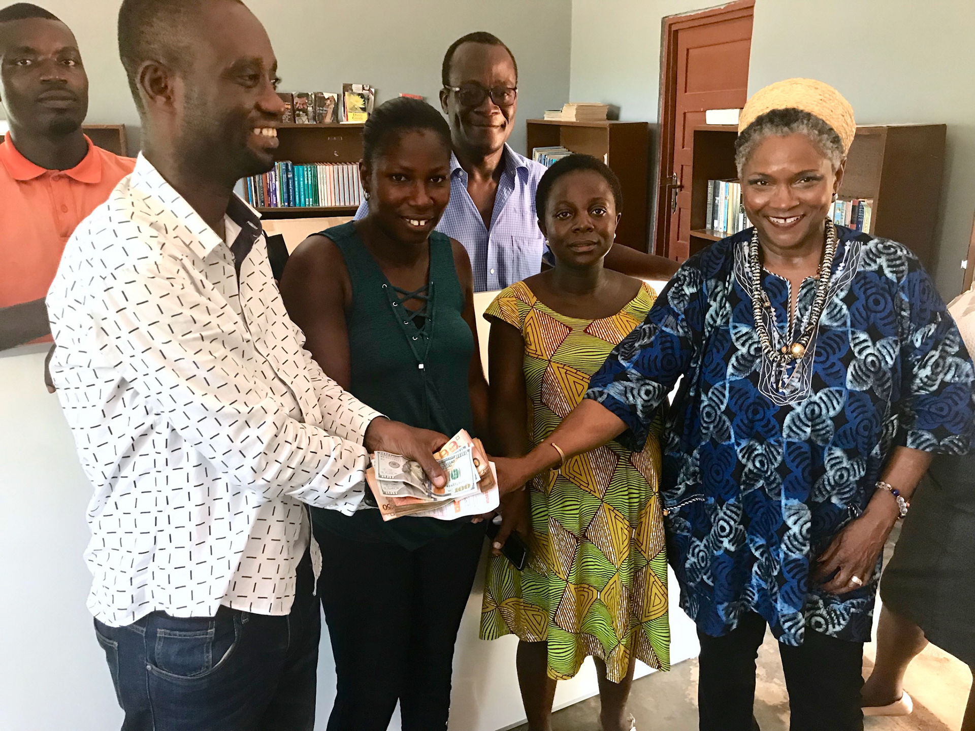 District Executive Accepting Donation From Lansing Sister Cities Program