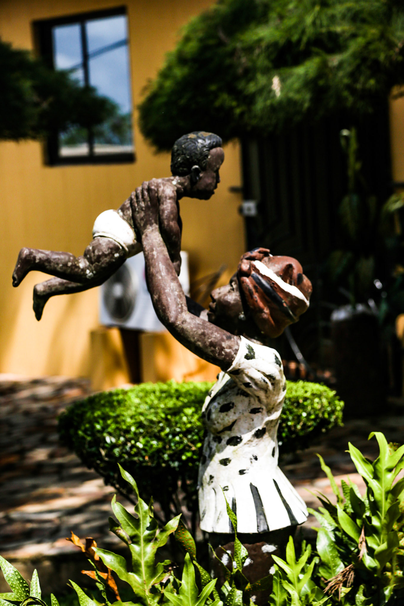 Statute In The Hotel Garden