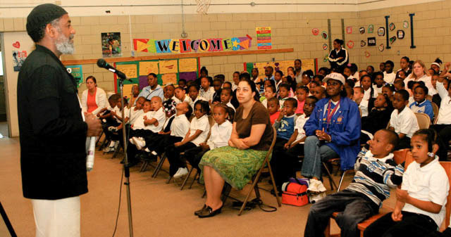New York artist Noah Jemisin addressing Shabazz Academy staff & students