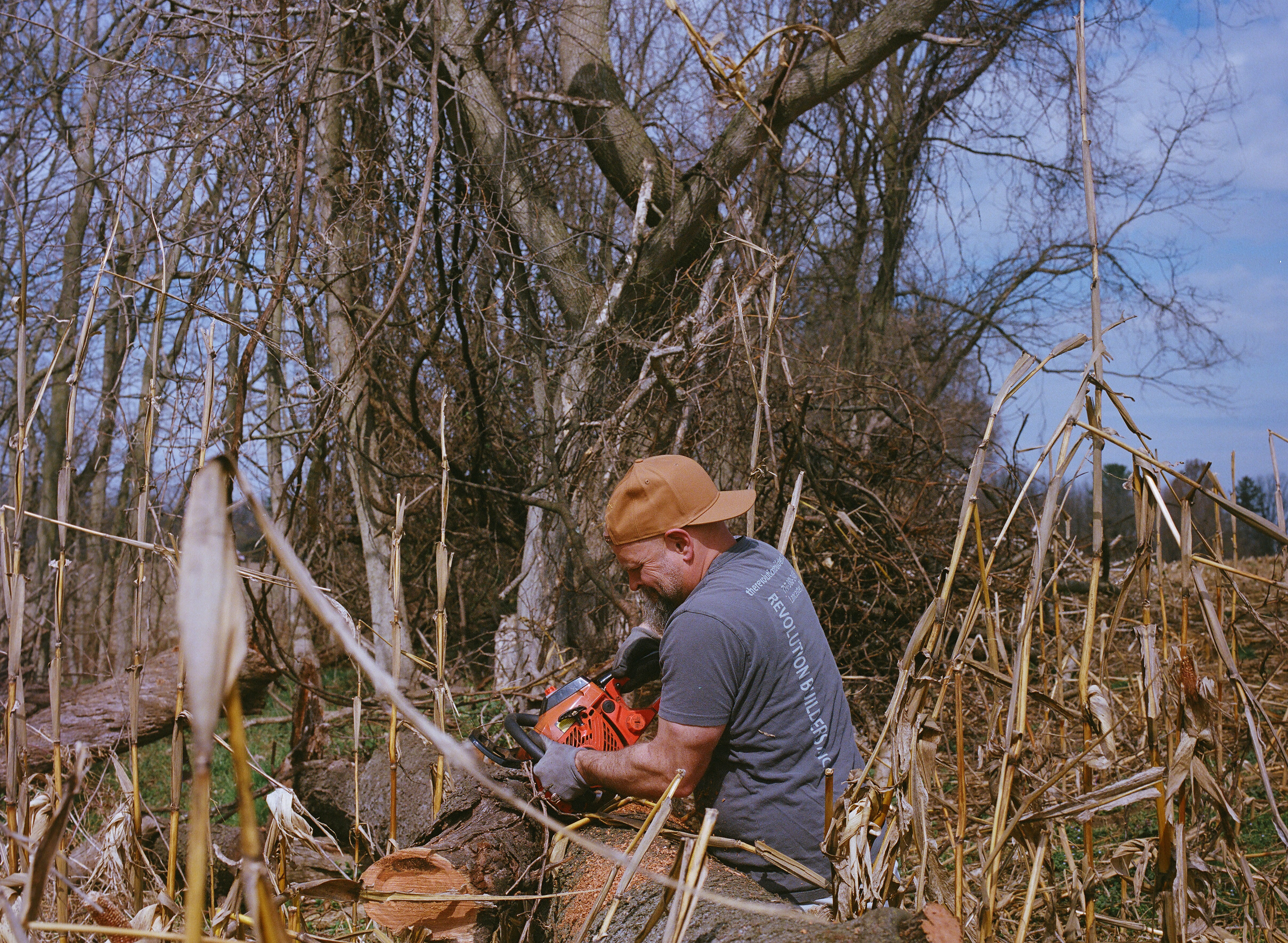 Dad sawing firewood