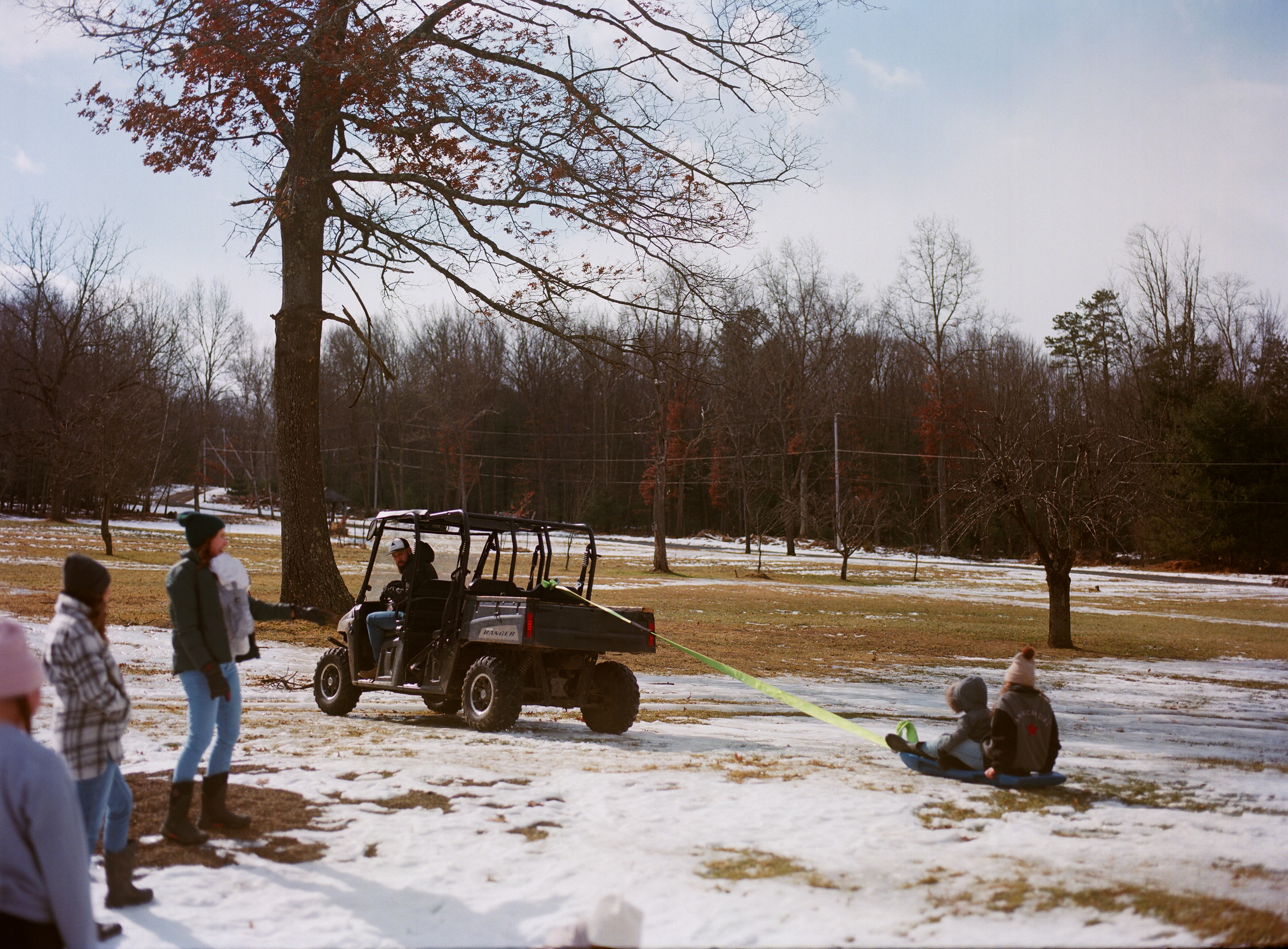 Jermey taking the kids for a sled ride