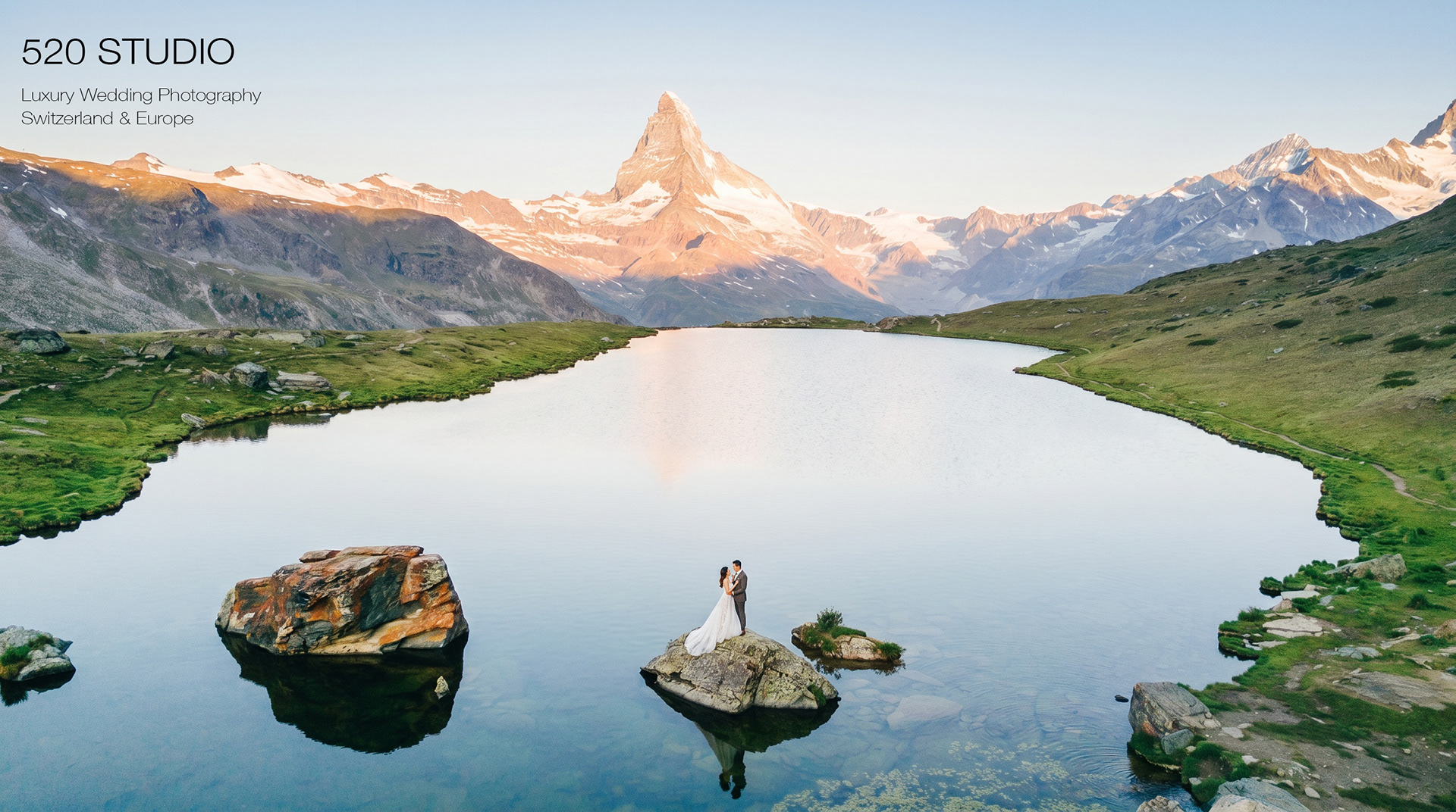 Luxury wedding couple at Stellisee lake with Matterhorn mountain in Switzerland