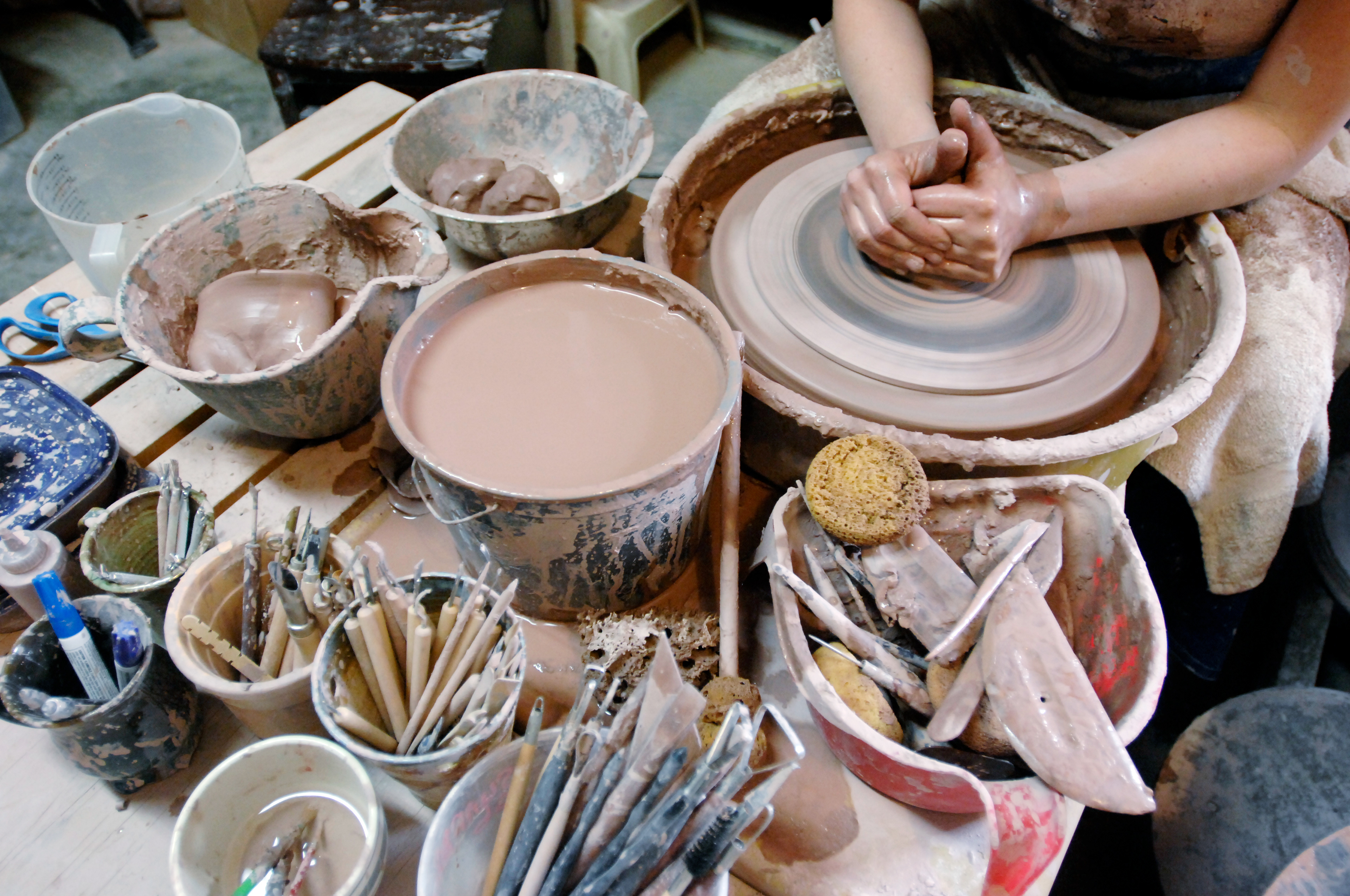 A variety of tools sit in easy reach of Kimberly McClary as she works at her wheel in Rineyville, Kentucky, Feb. 12, 2015. (Jill Pickett/The News-Enterprise)