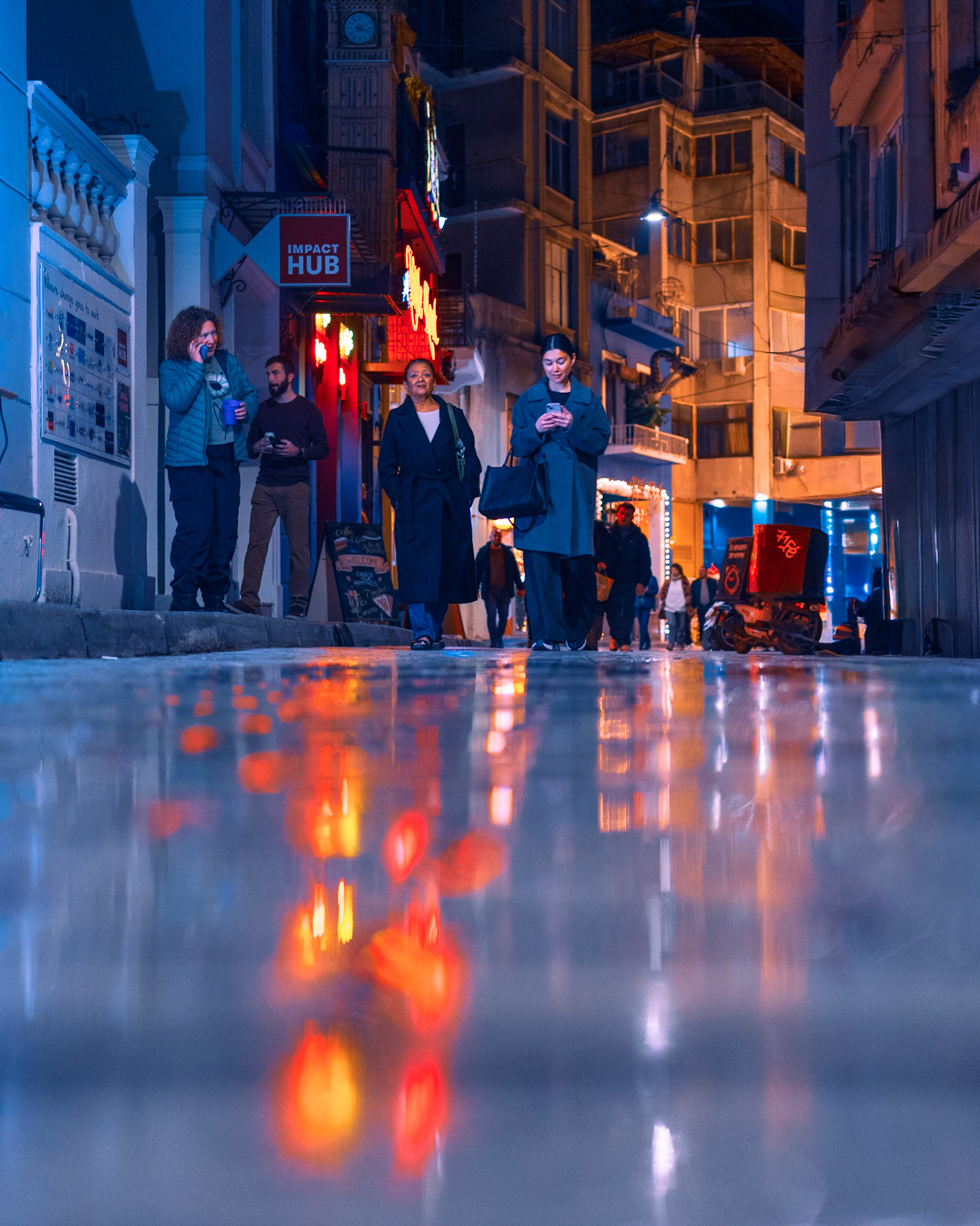 With the alleys of #Psirri still moist from the last rain 🌧️, the colorful #reflections are everywhere, and as people blend in my #SonyA7iii's sight, I leave the #35mmlens do the rest, creating that beauty point of view 📸