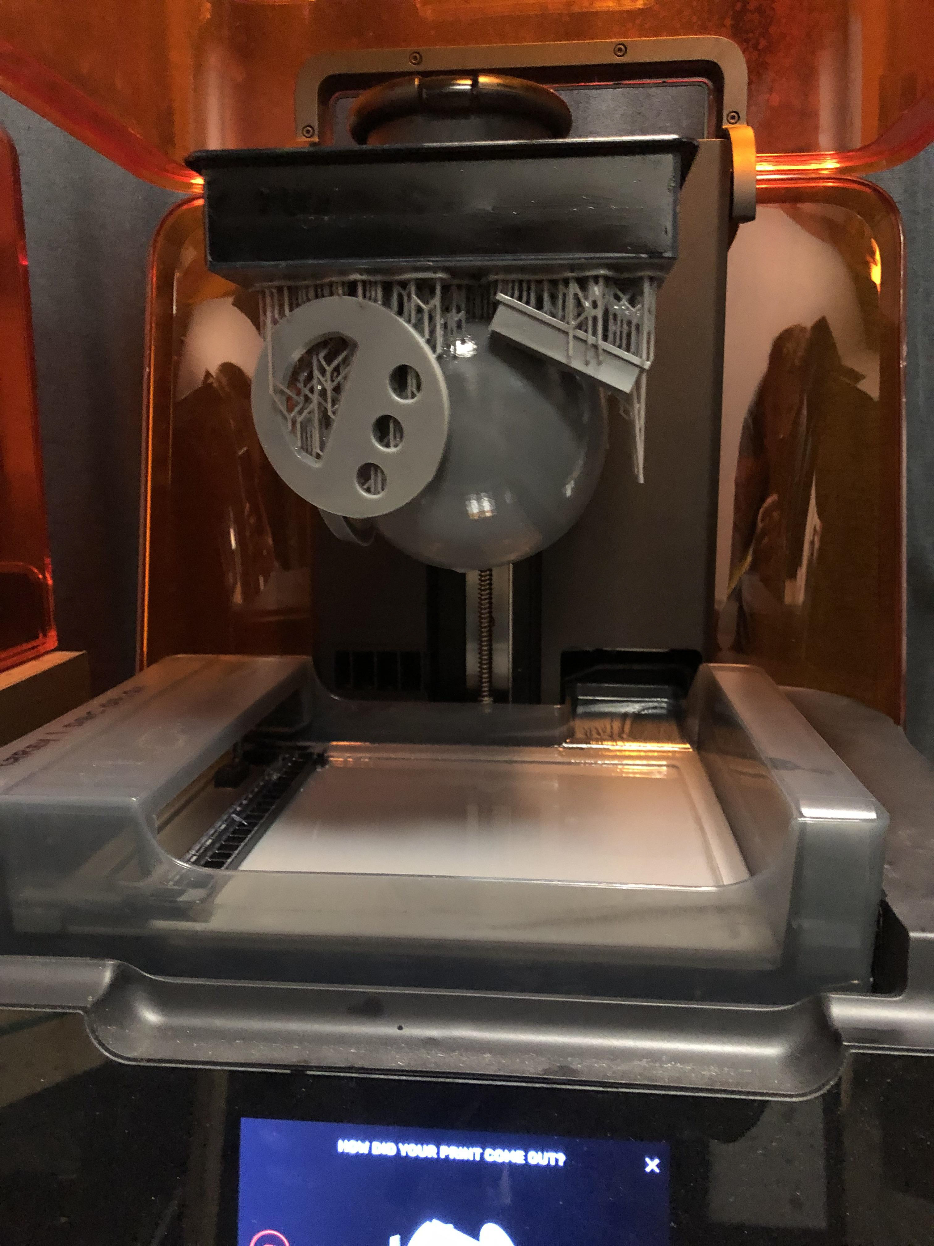 Large timer being removed from resin