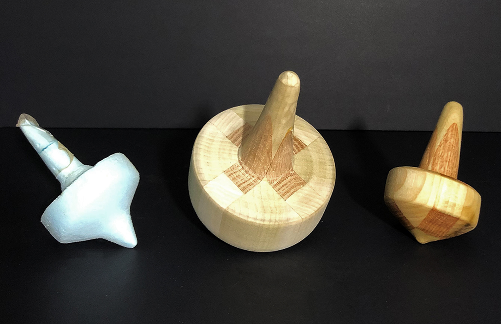From Prototype to Current Design of Spinning Top